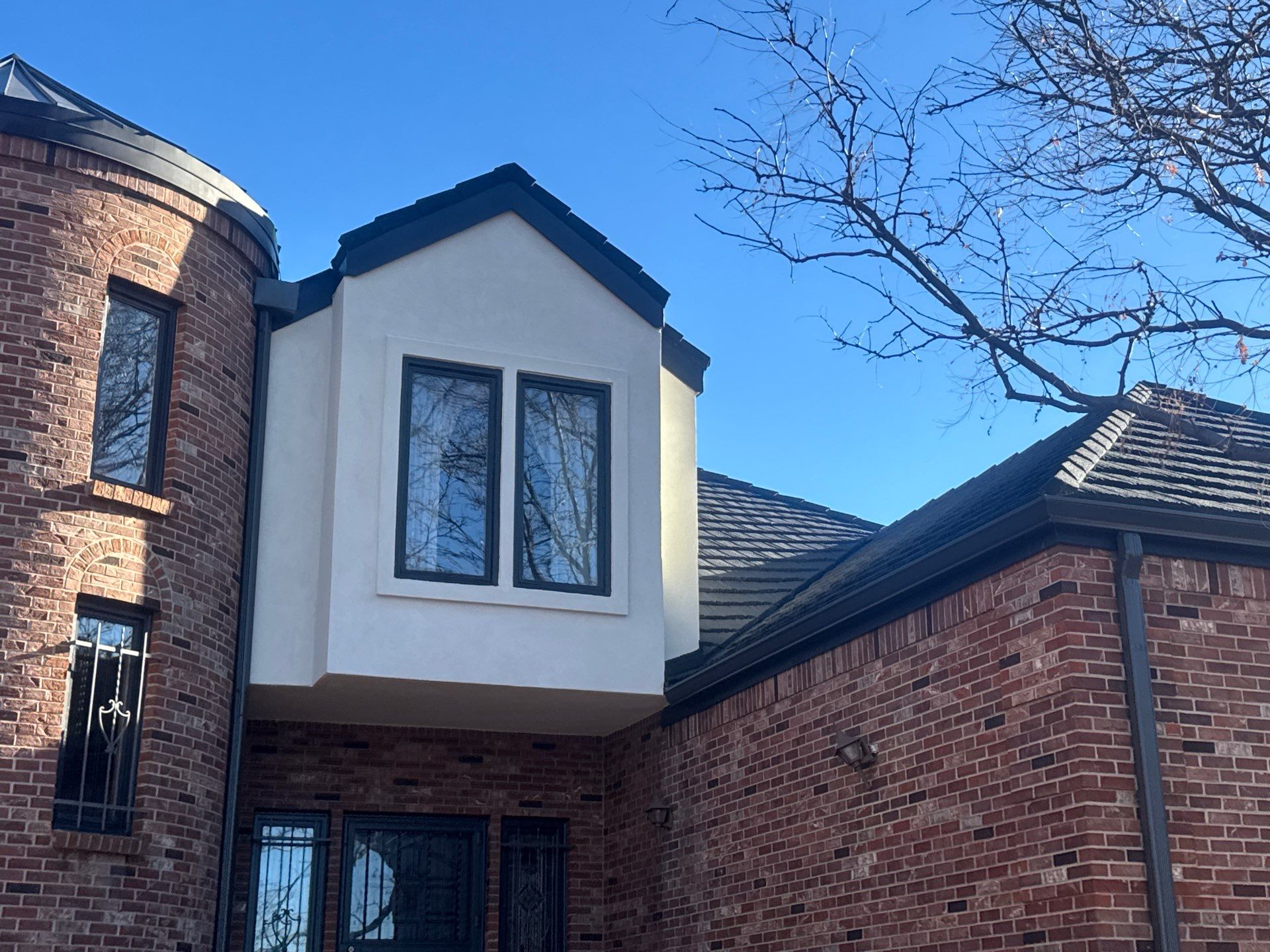 Unified Stone Coated Roof & Stucco Remodle by Blue Peaks Roofing LLC