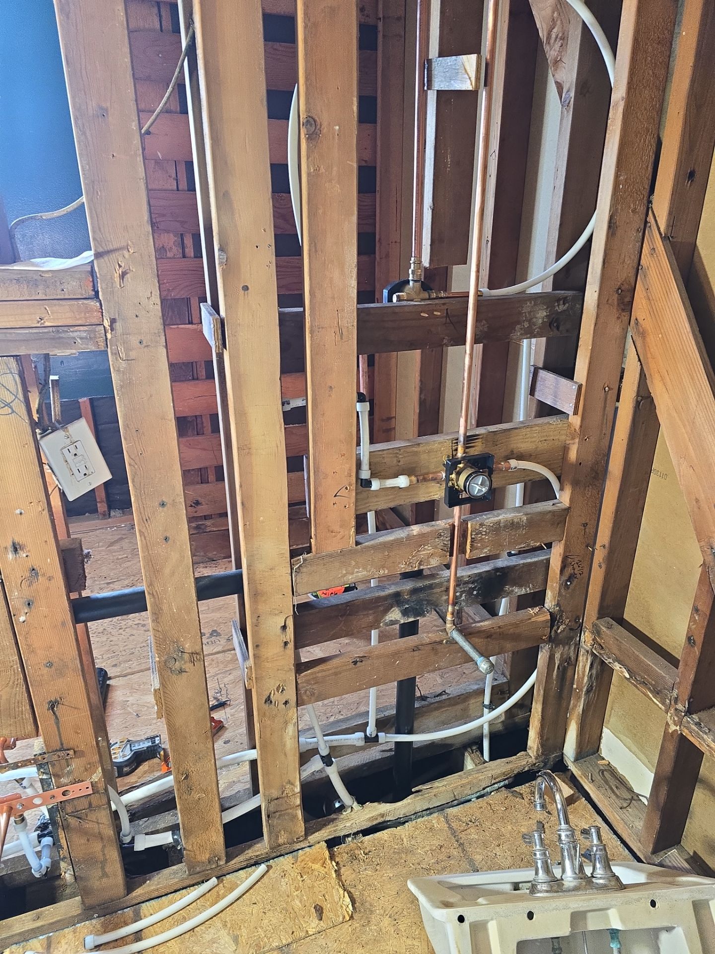 Installing New Piping and Checking Underneath Home by Us Plumbing