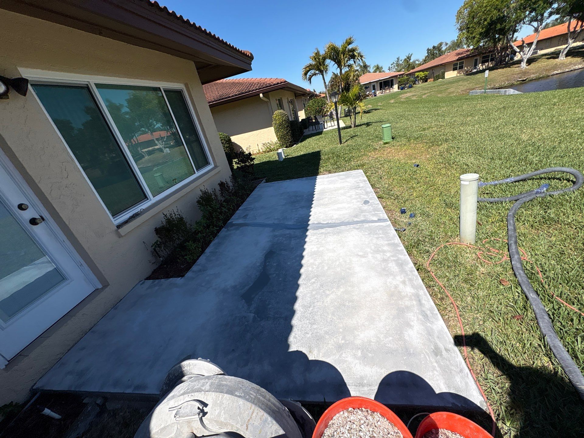 Bradenton, FL Driveway and Patio Epoxy Combination by Performance Floors & Coating