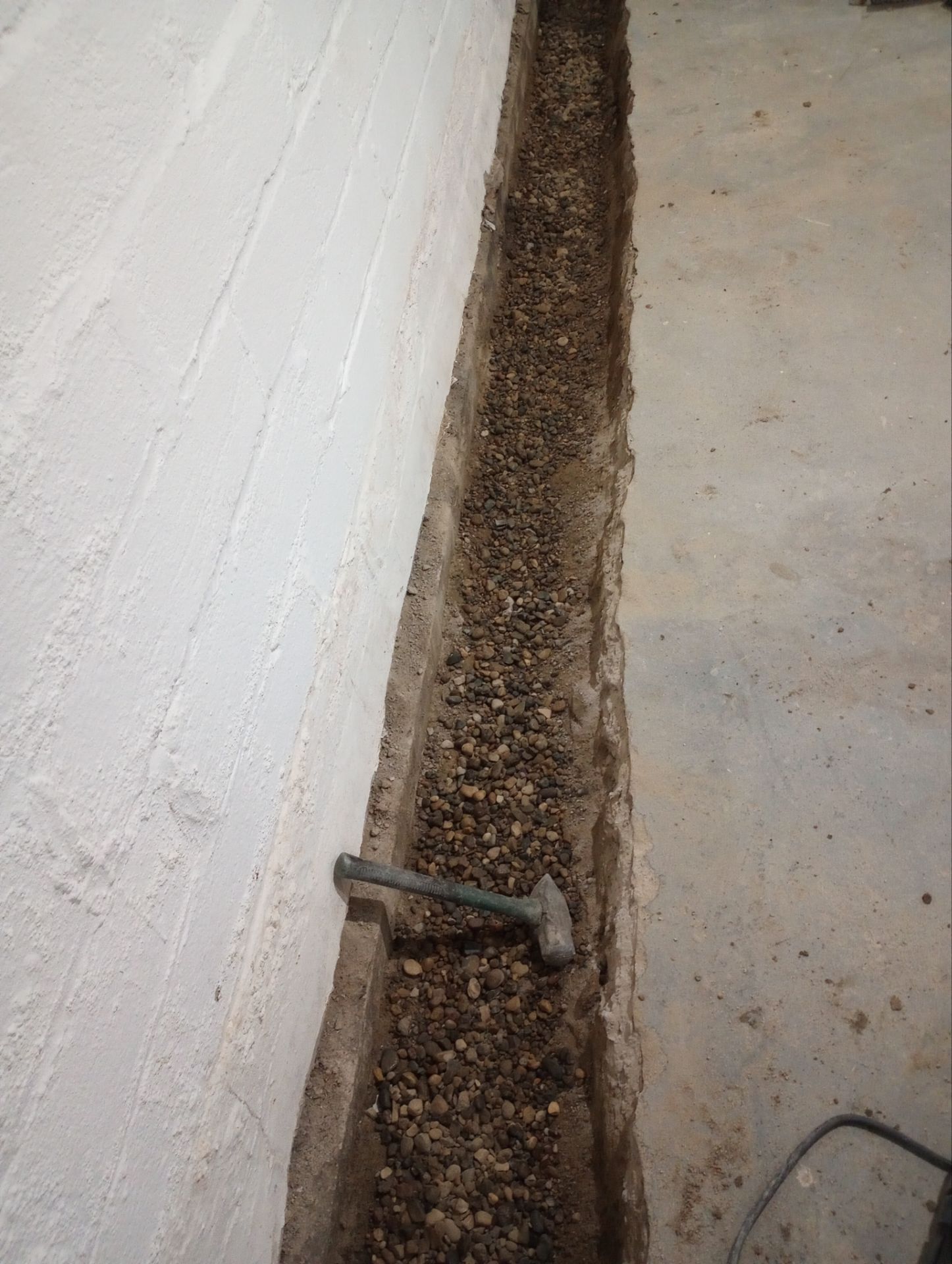 Interior Drain Tile & Wall Drainage in Northeast Minneapolis by Waterproofing Northeast