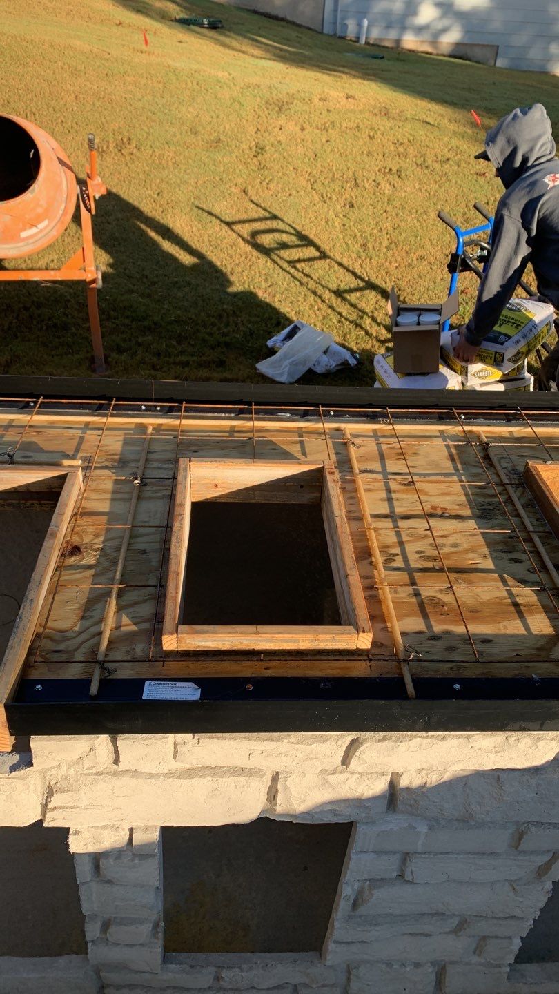 Outdoor Kitchen on Lake Keowee by Xtreme Concrete Services