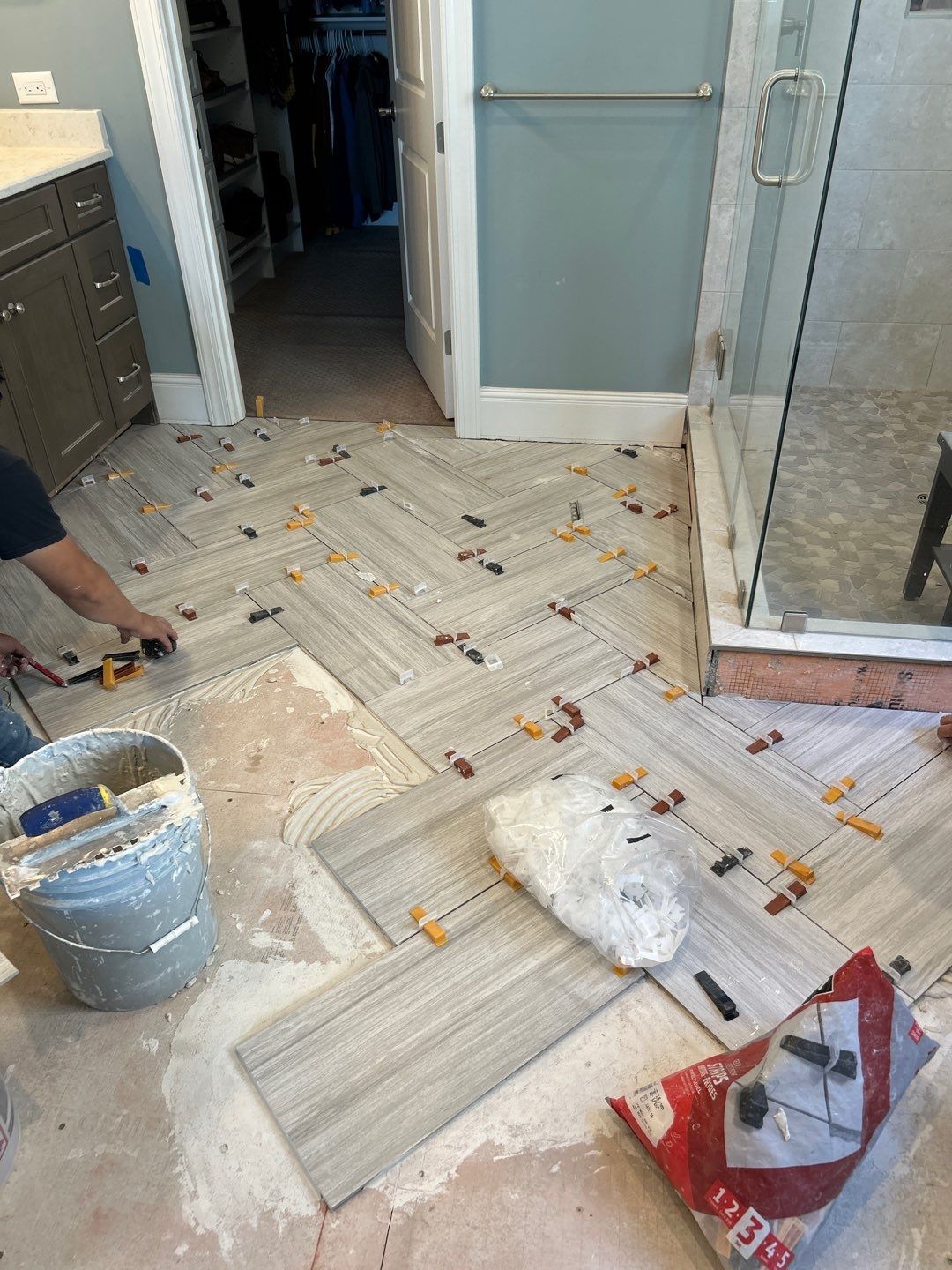 Master Bath Tile Repair  by Footprints Floors of Nashville