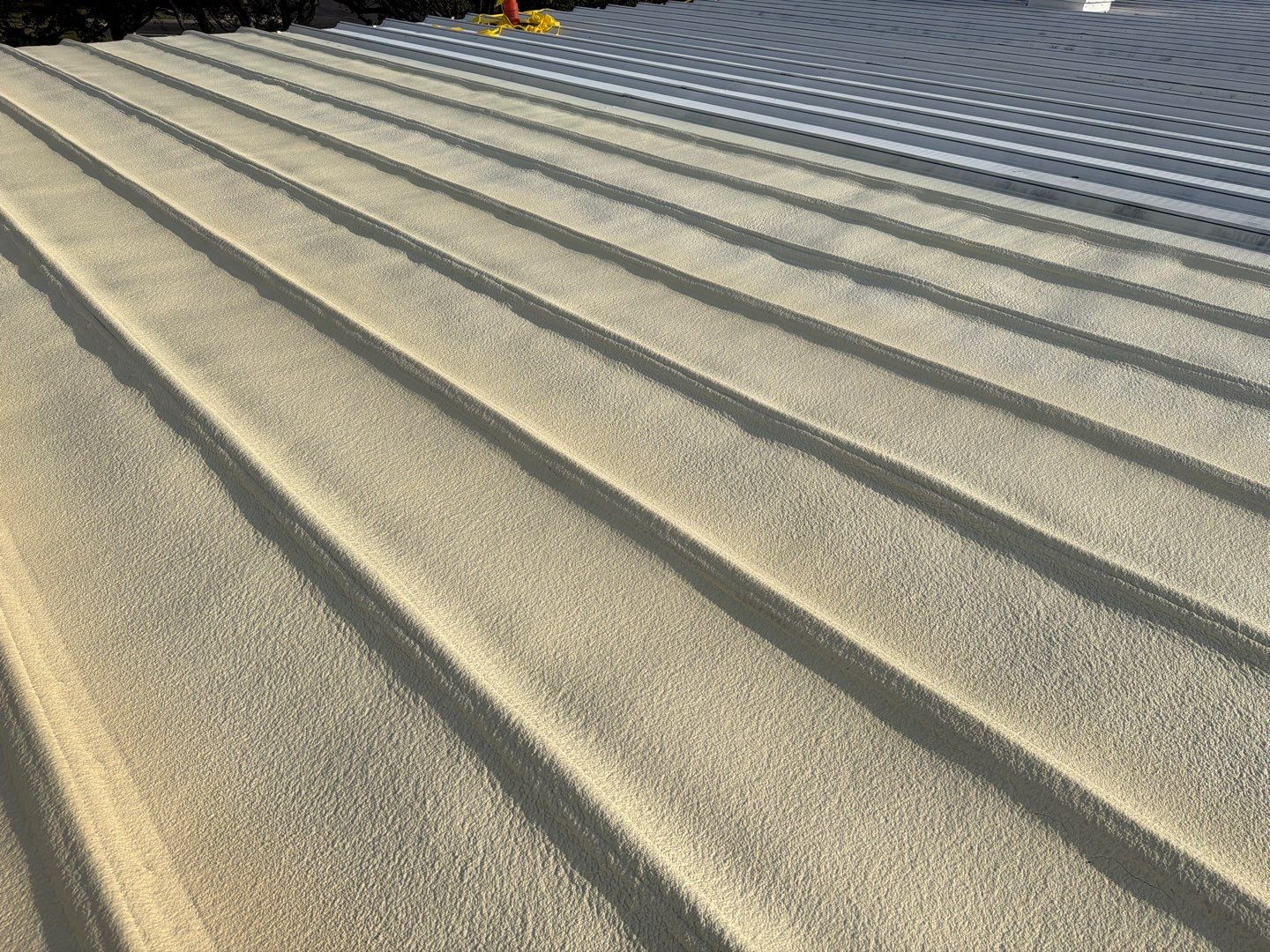 Sarasota Industrial Warehouse Metal Roof Silicone Coating Restoration by CES Roofing
