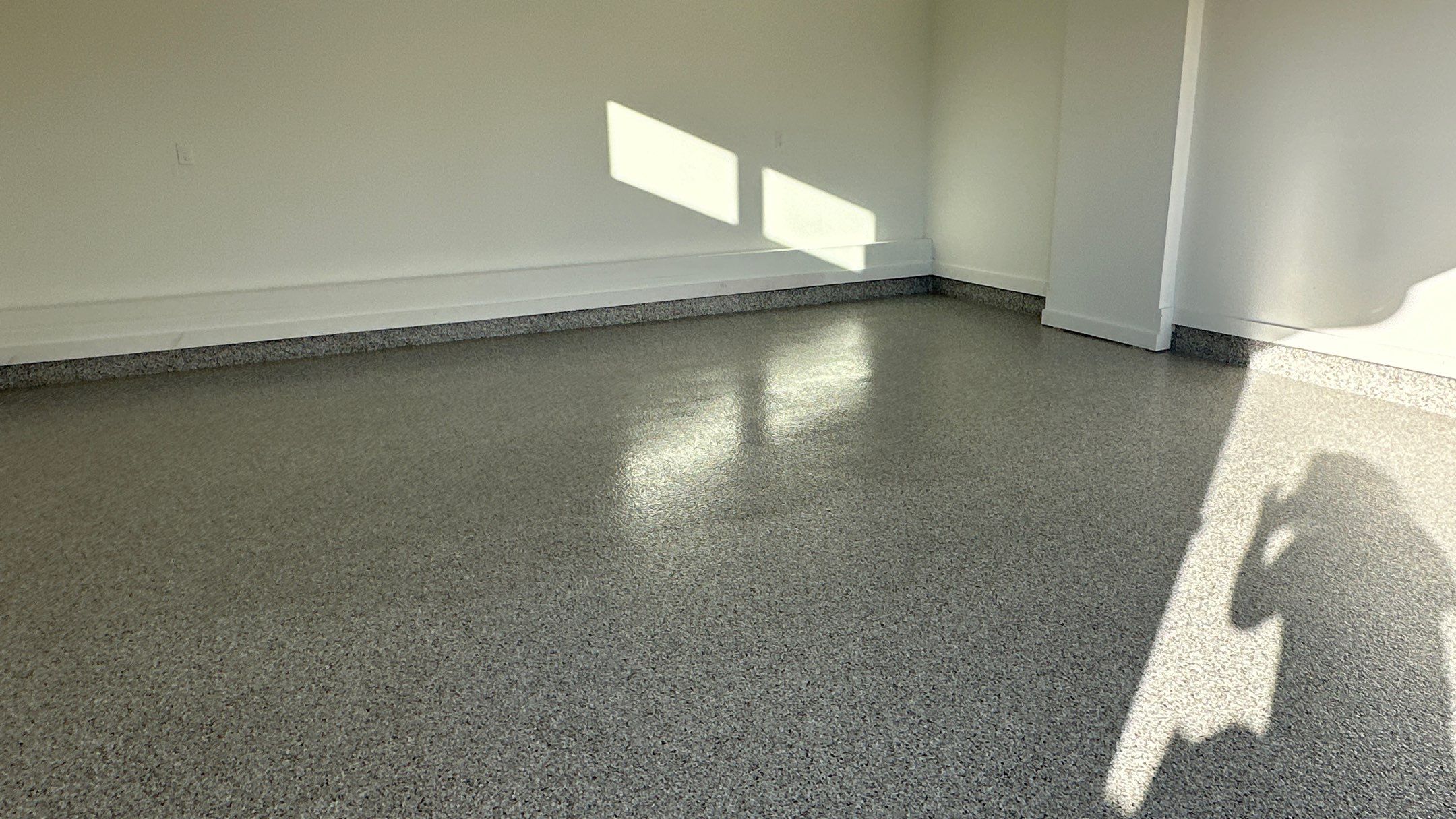 Mike M. got him self a beautiful Coyote flake floor by Banner Garage