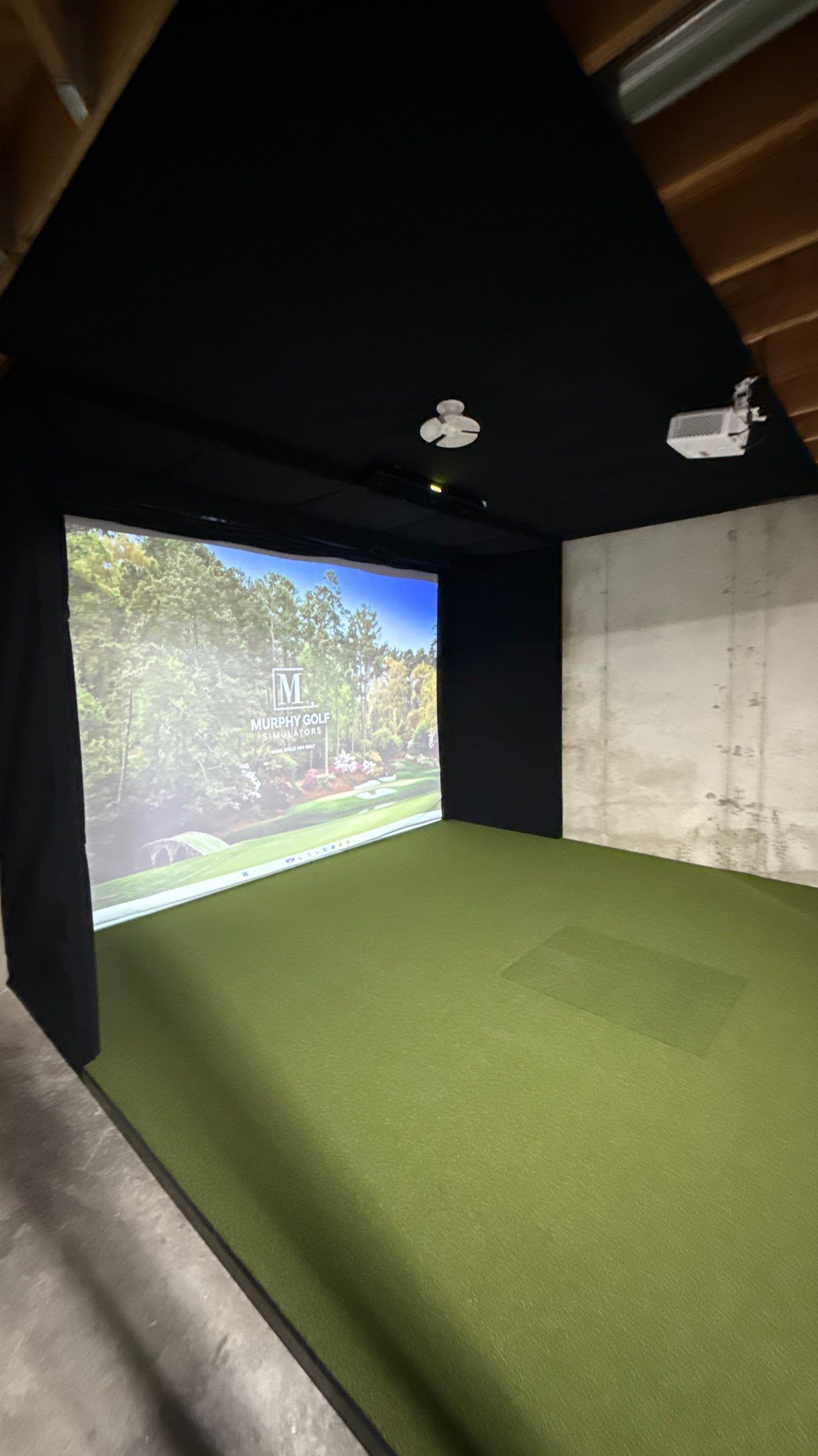 Rex Went With A Custom Golf Simulator  by Banner Garage