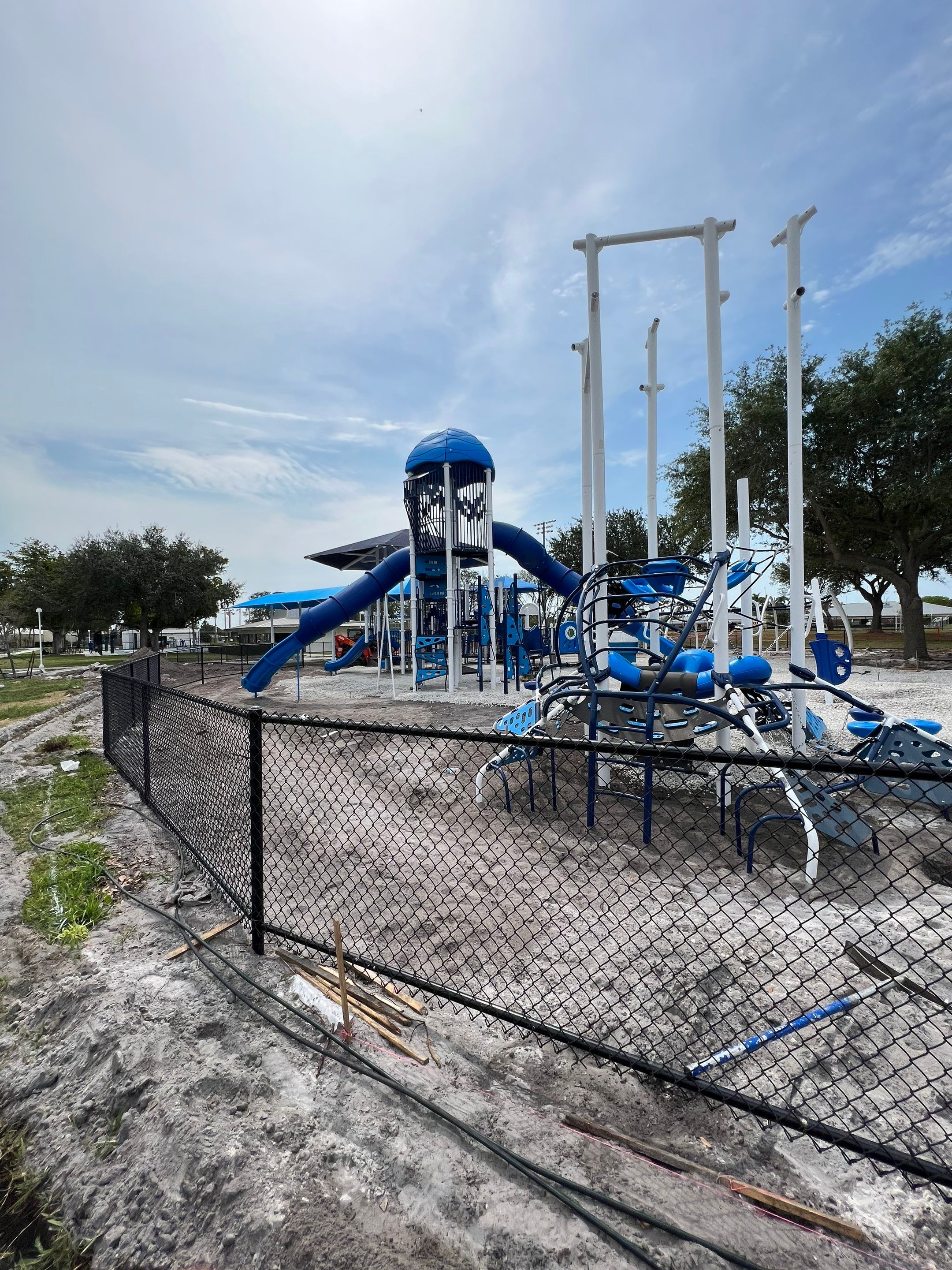 Vinyl Coated Chain-link fence for the City of Naples around Fleischmann Park Playground.  by Asap fence and gates, LLC
