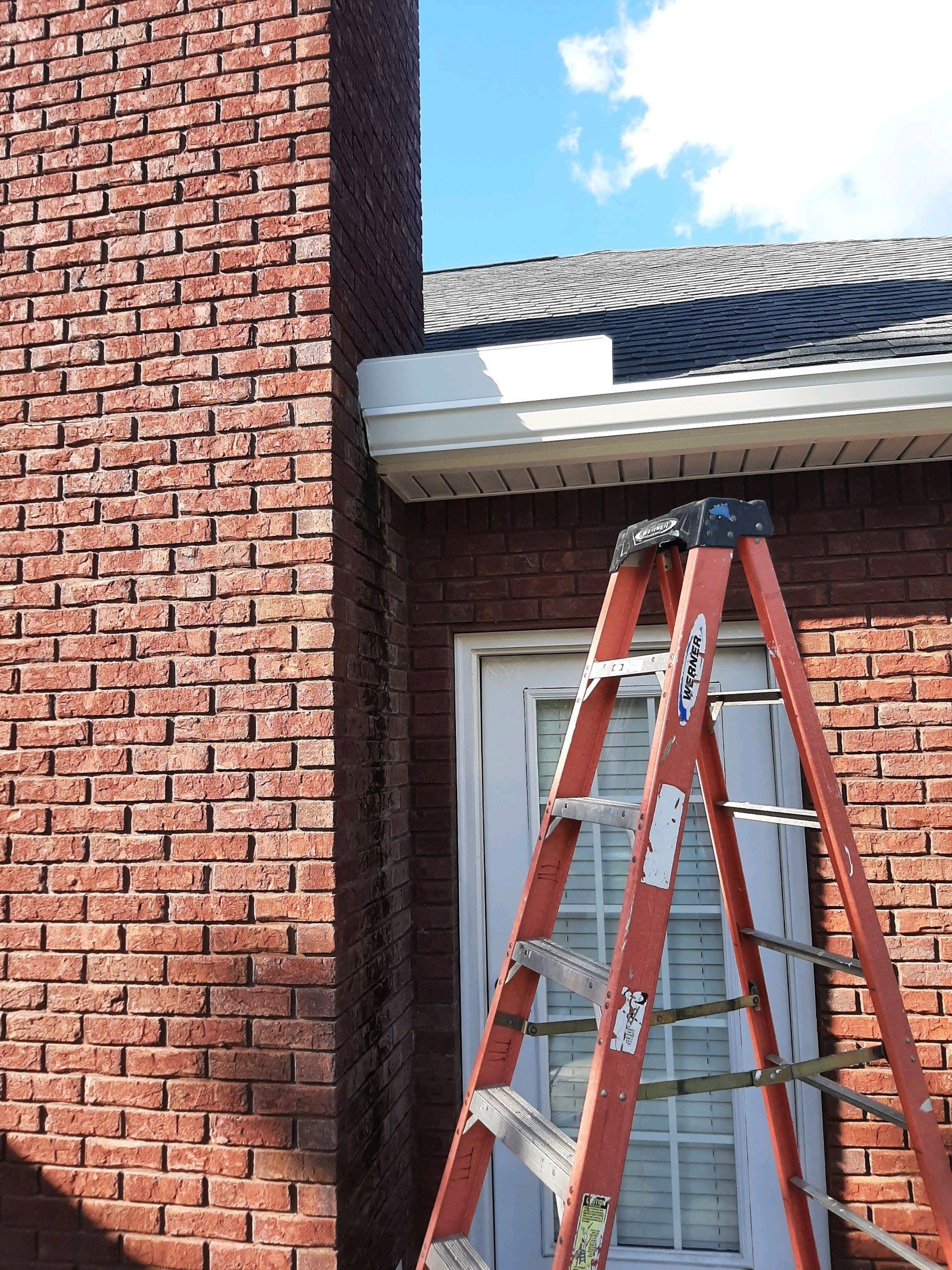 Gutter Installation using White K-Style Seamless Gutters by Gutter Professors