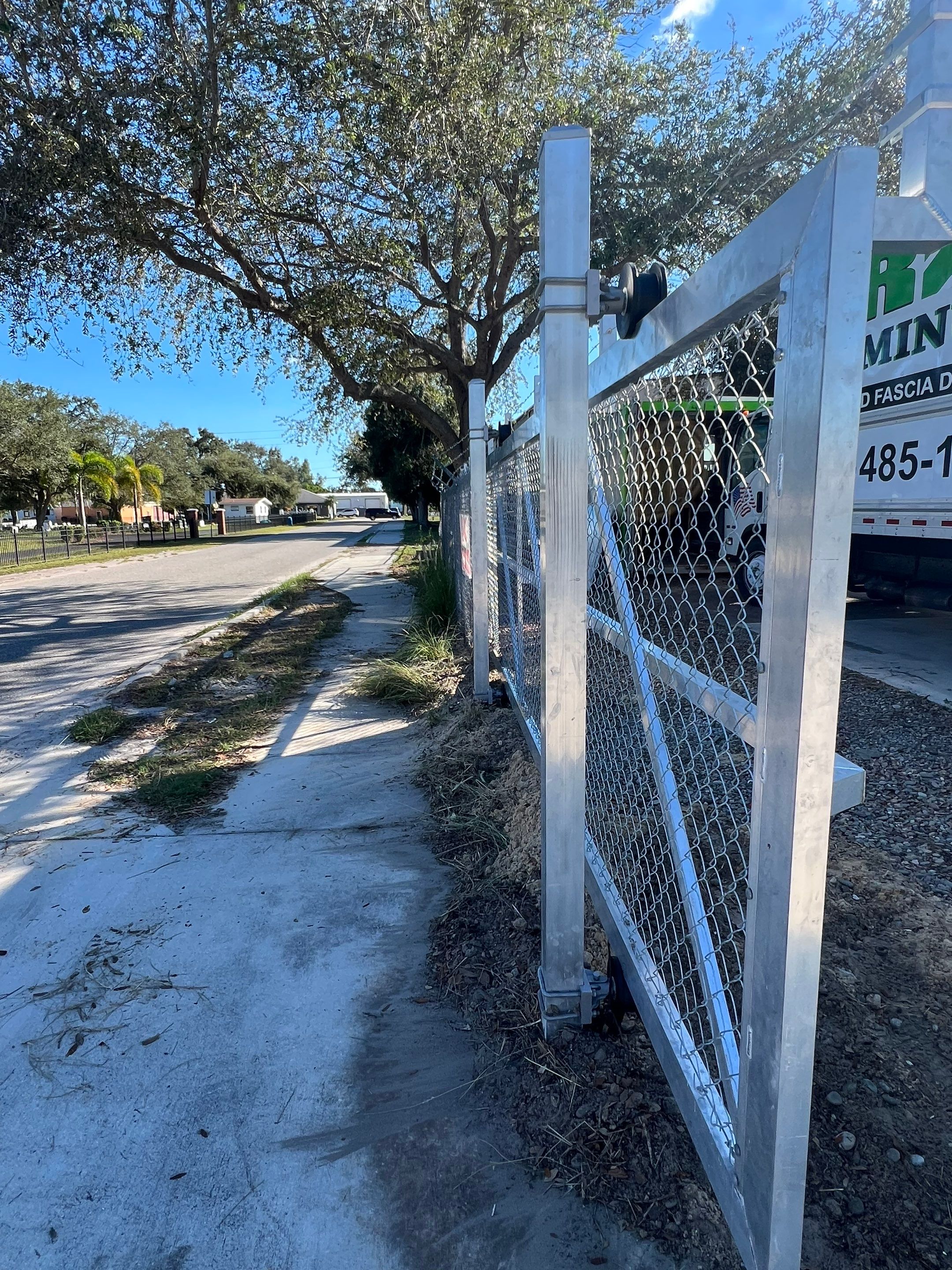 Commercial Fence Installation using Aluminum Estate Gate by Asap fence and gates, LLC
