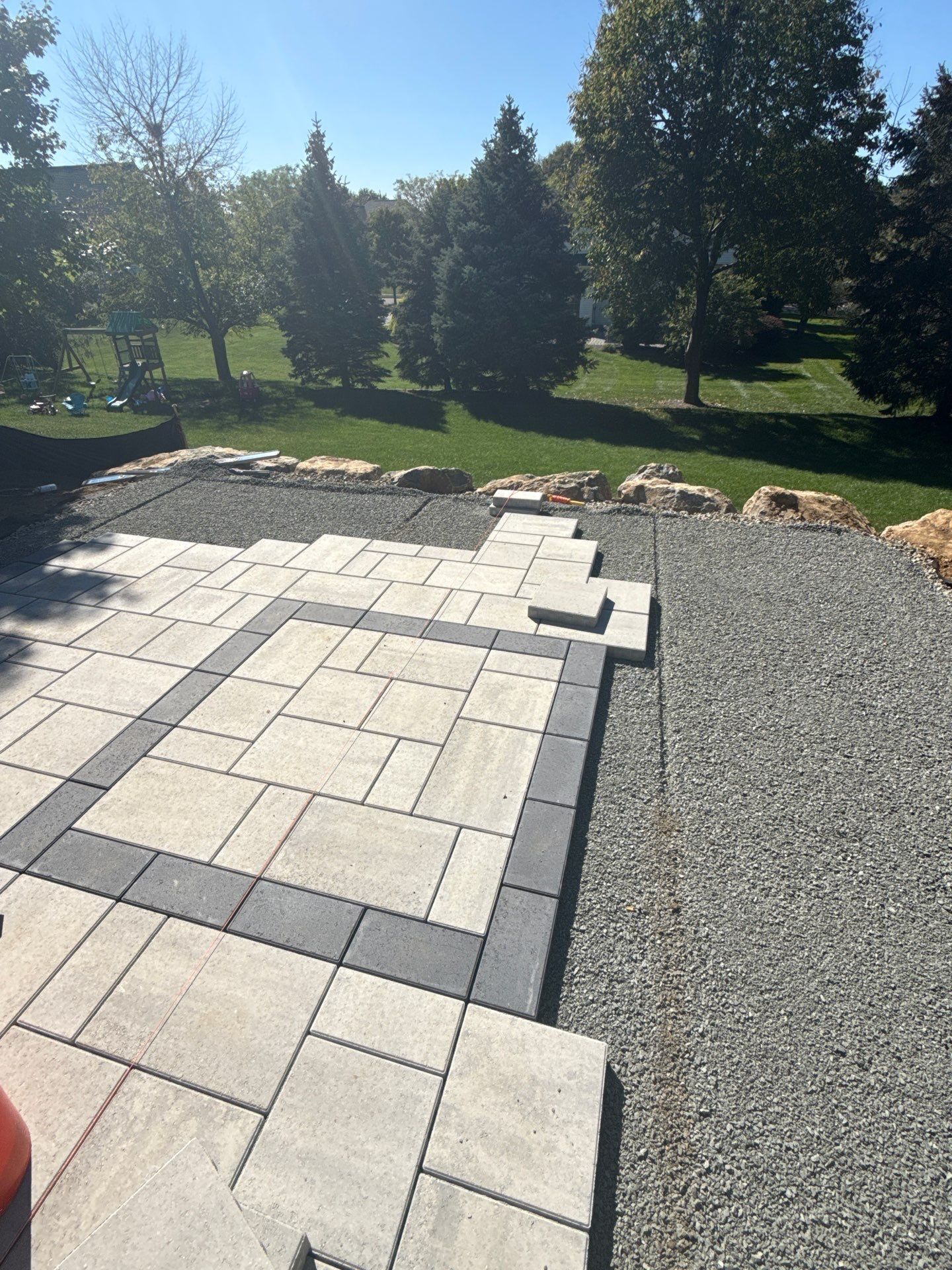 Backyard Retreat: Techo-Bloc Patio + Firepit Lounge by Saylor’s Lawn & Landscape