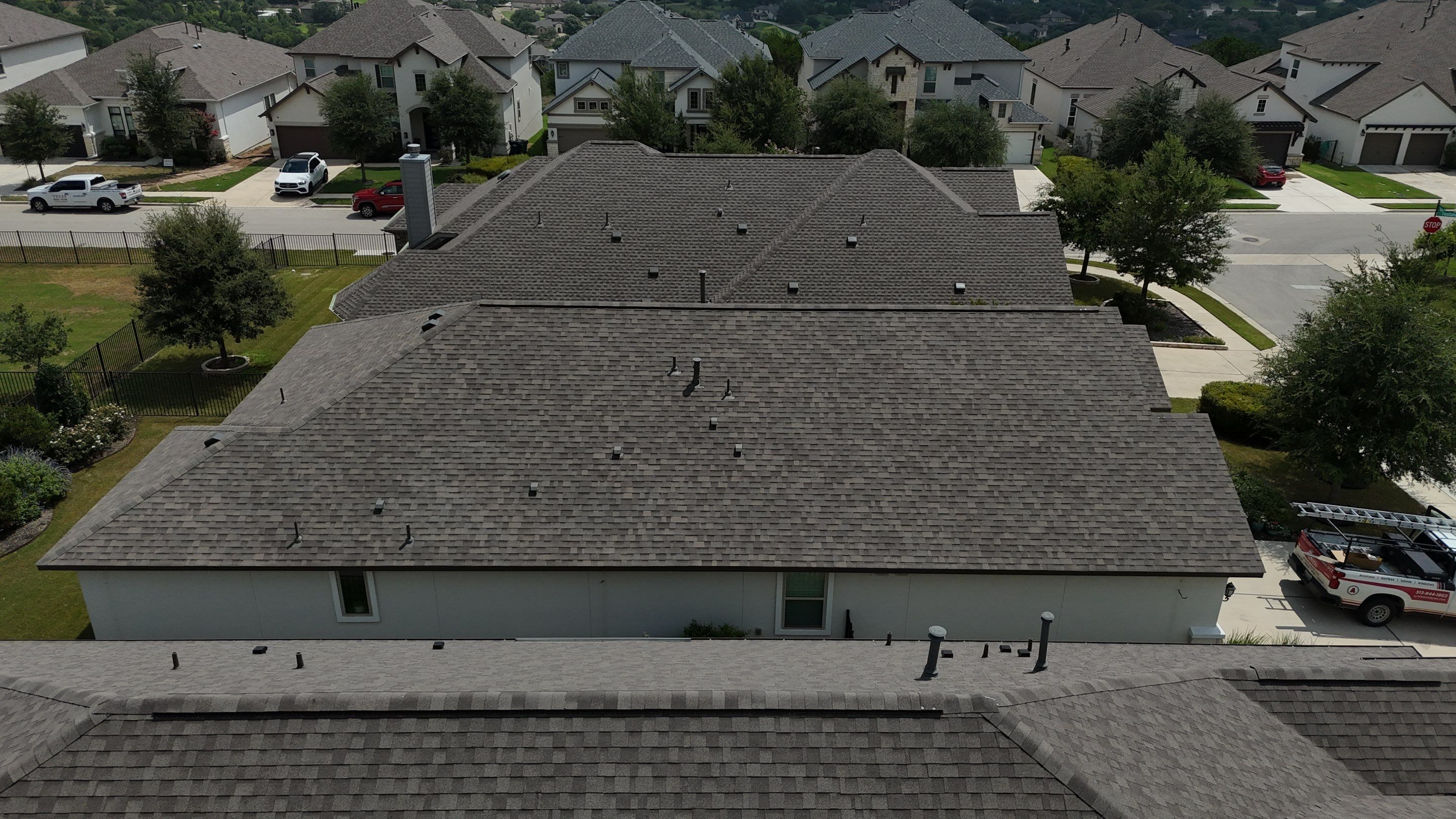 Residential Roof Replacement using Malarkey - Vista AR - Weathered Wood Plus by Action Exteriors Austin