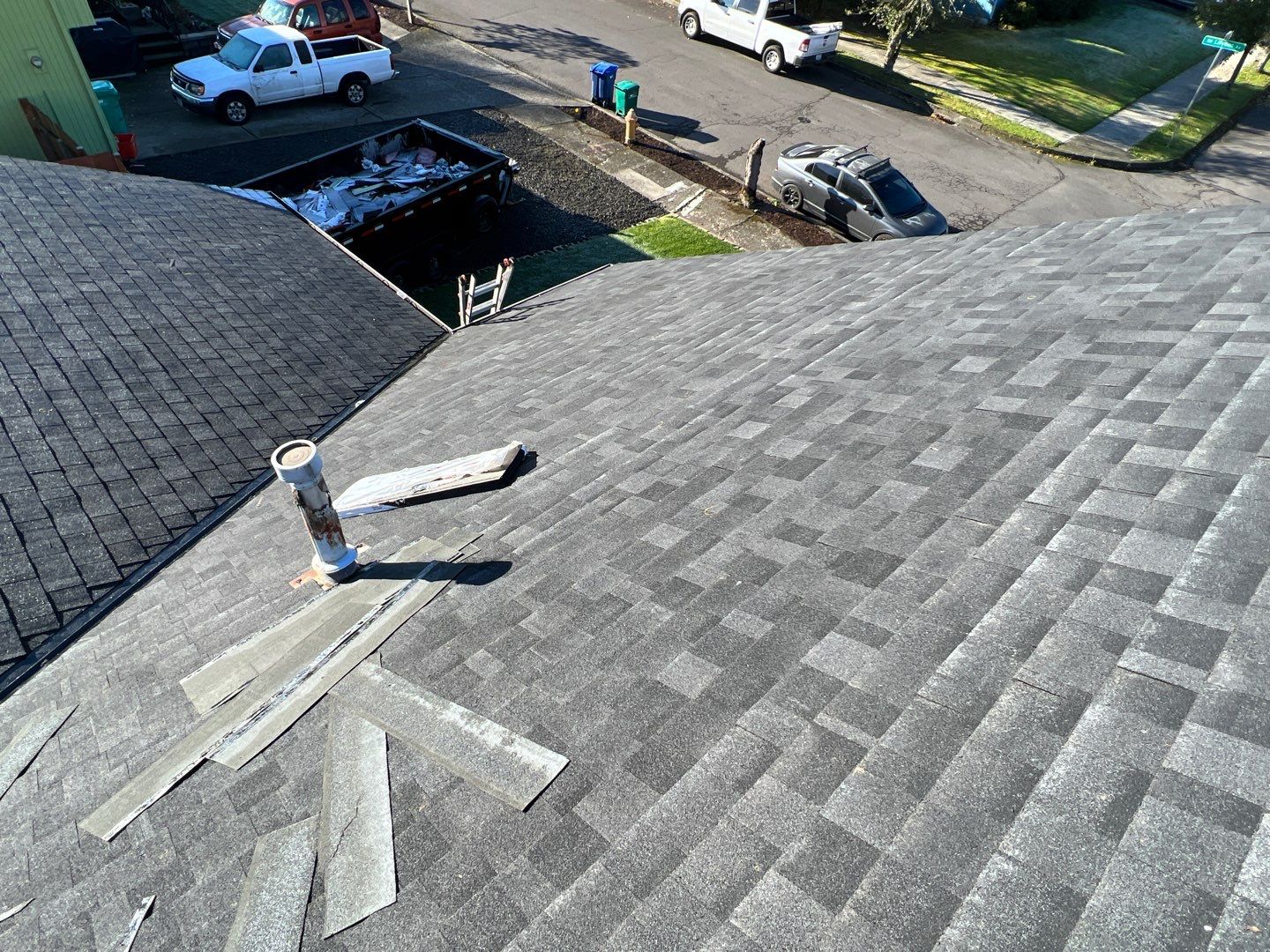 Estate Gray Shingles by Reimagine Roofing