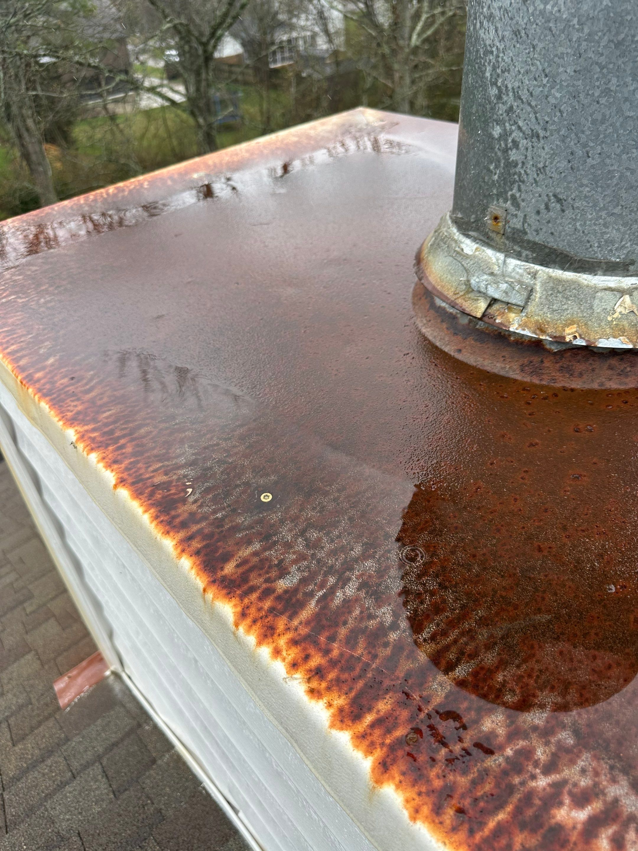 Residential Roofing Repair using Custom Fabricated Chimney Cap by Paragon Roofing