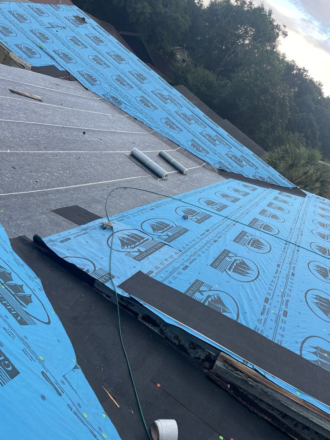 Residential Roofing Installation using Roof Replacement by American Roofing & Construction LLC