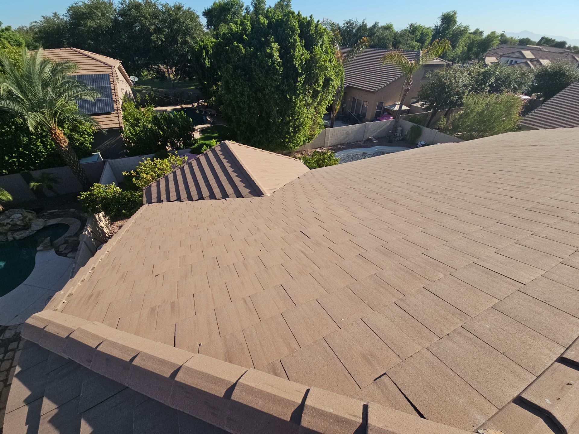 Residential Roofing Installation using Concrete Tile by Weather-Tite Exteriors LLC