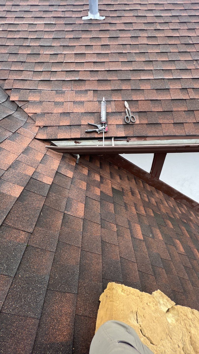 Step flashing repair on roof to wall by Pro Home Services Inc