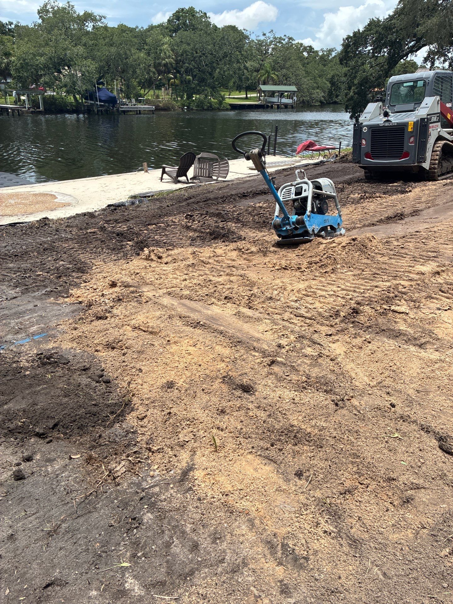 Grading back yard oasis by Level One Grading 