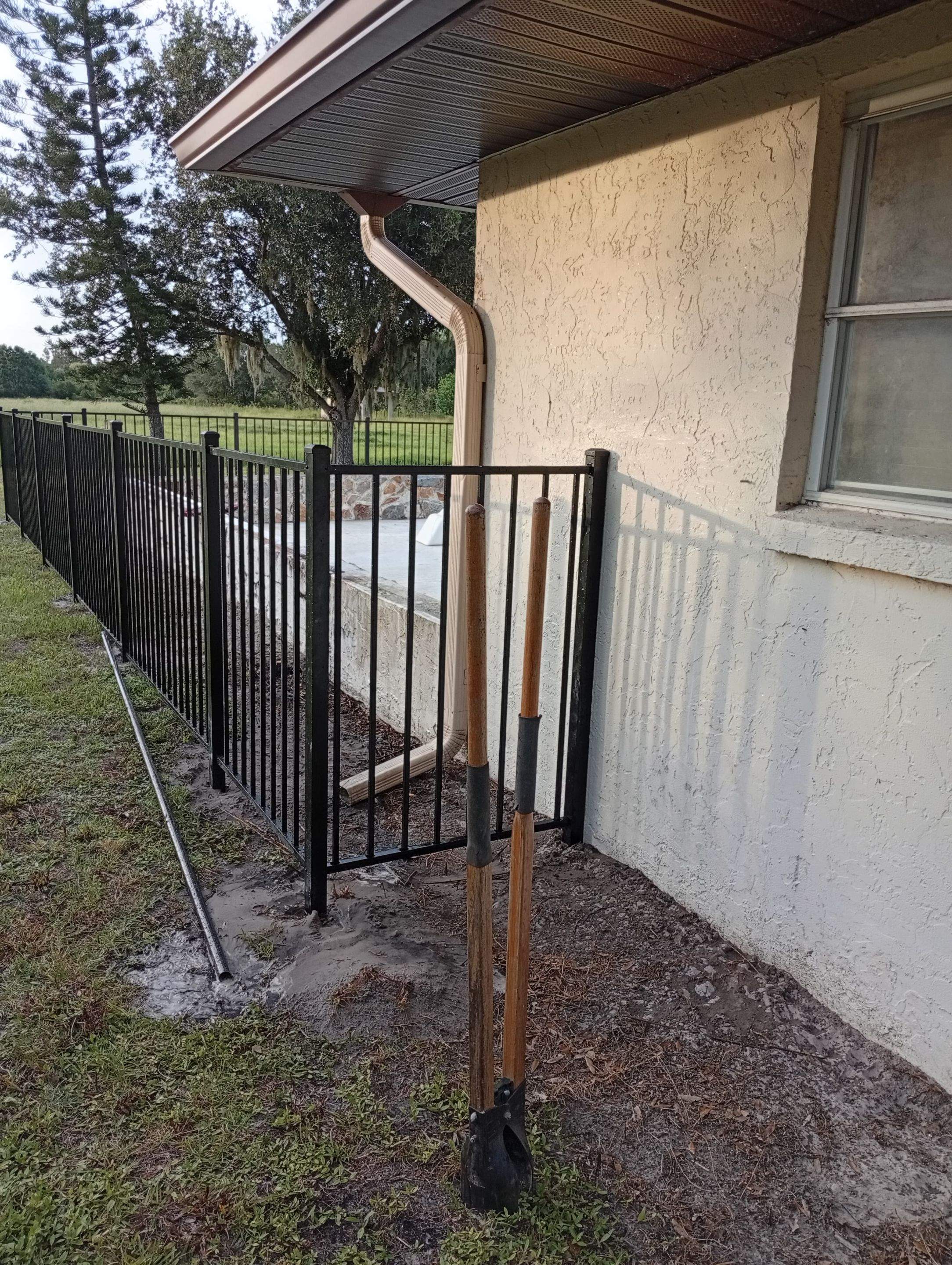 Black Aluminum Pool Safety Fence Installation in Punta Gorda by True Fence LLC