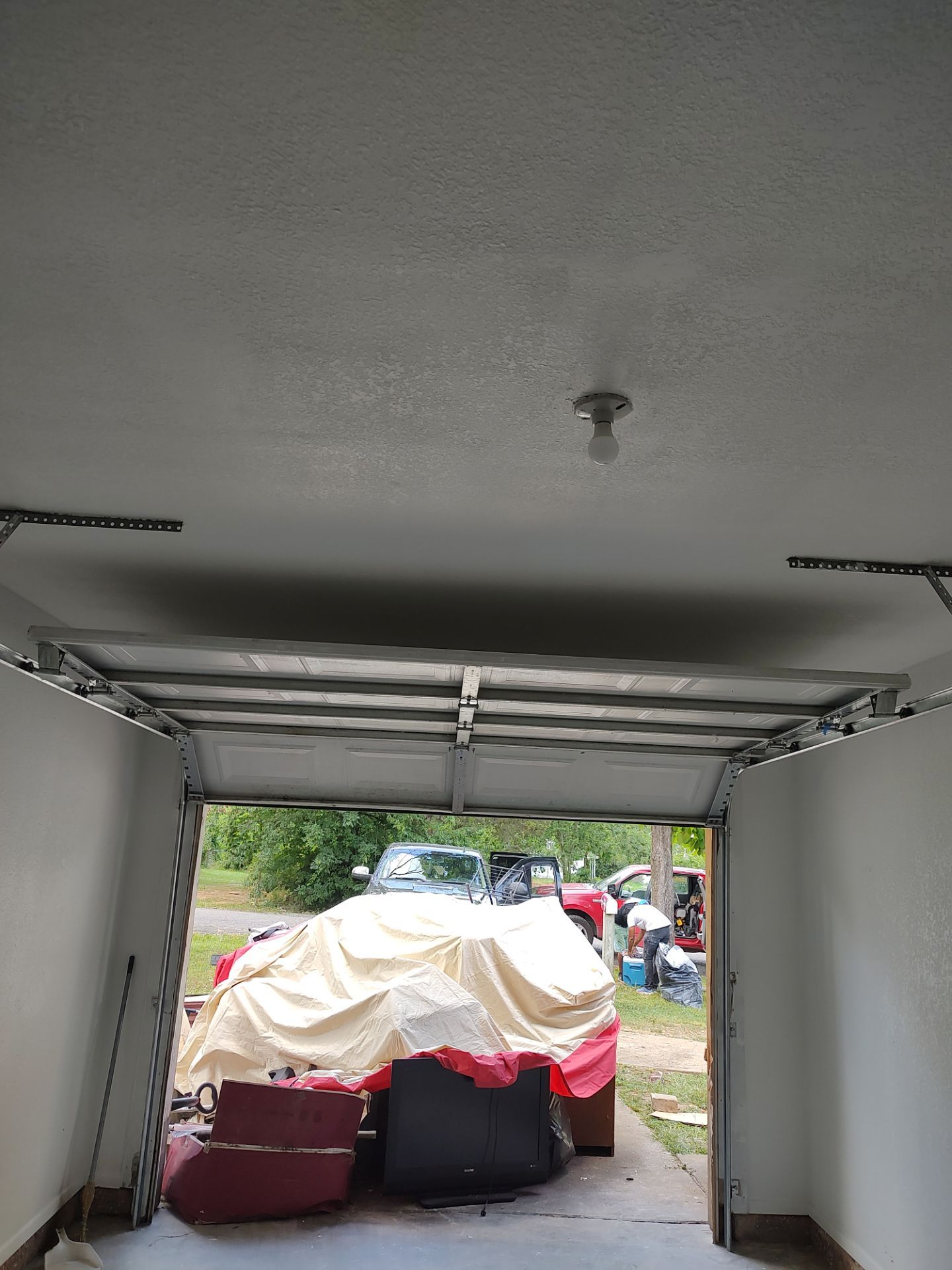 Garage transformation!! by In & Out Construction & Remodeling, LLC