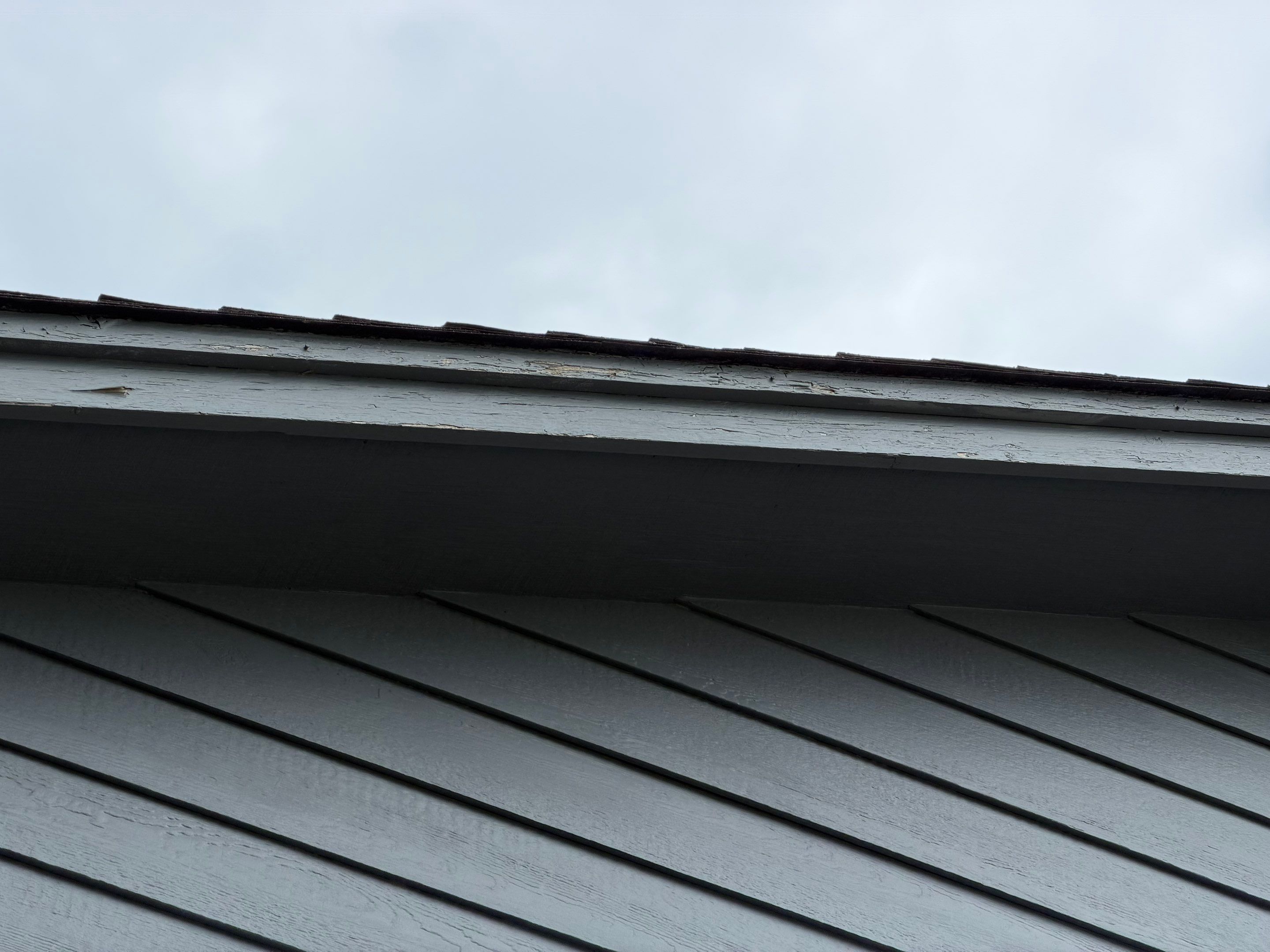 Full Exterior Painting for Gray Siding and Trim in Sioux Falls by Select Painting, Coatings & Garage Cabinets