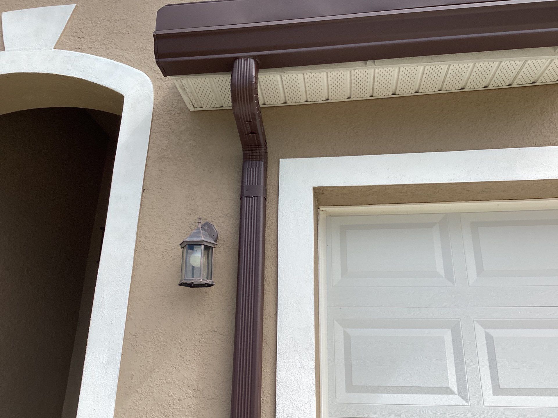 Royal Brown Seamless Gutters in Cape Coral FL by Gutter Professors