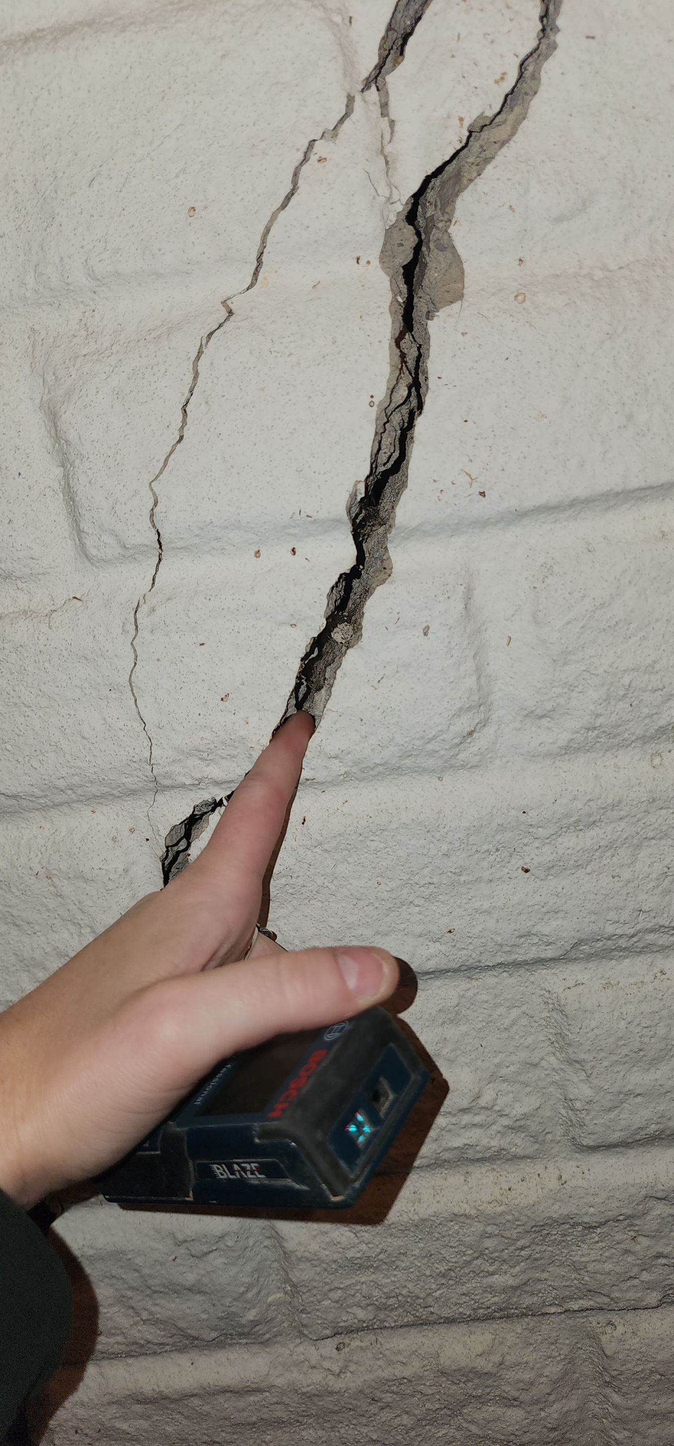 Helical Piers and Wall Crack Injections by Toledo Basement Repair
