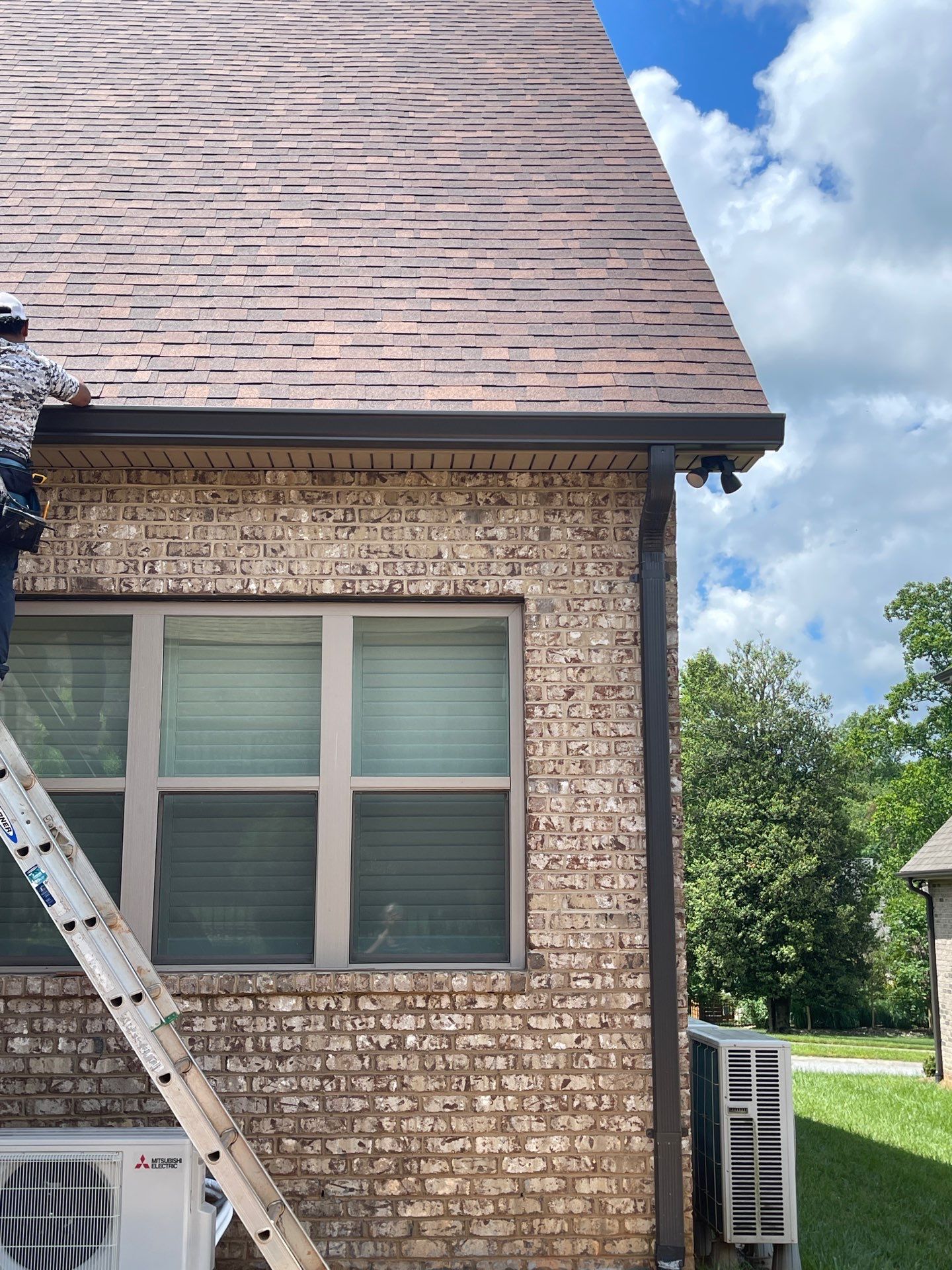 6" Seamless Gutters in Dark Bronze by Peak 2 Peak Services LLC