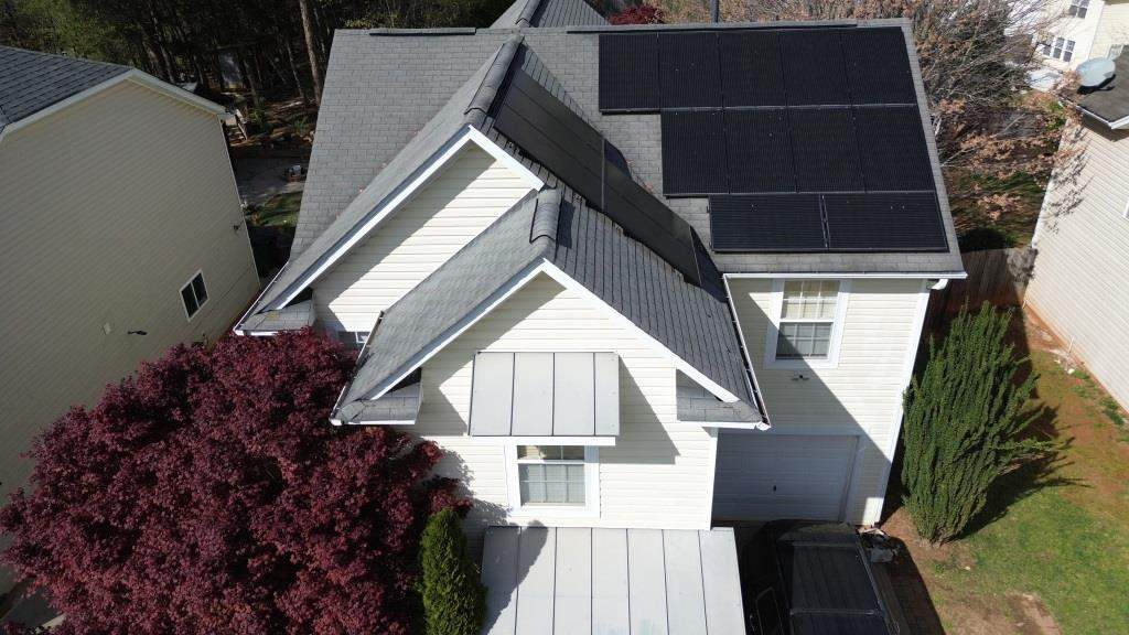 Roof and downspout replacement by hail and wind damage by Just Brilliant Restoration JBR