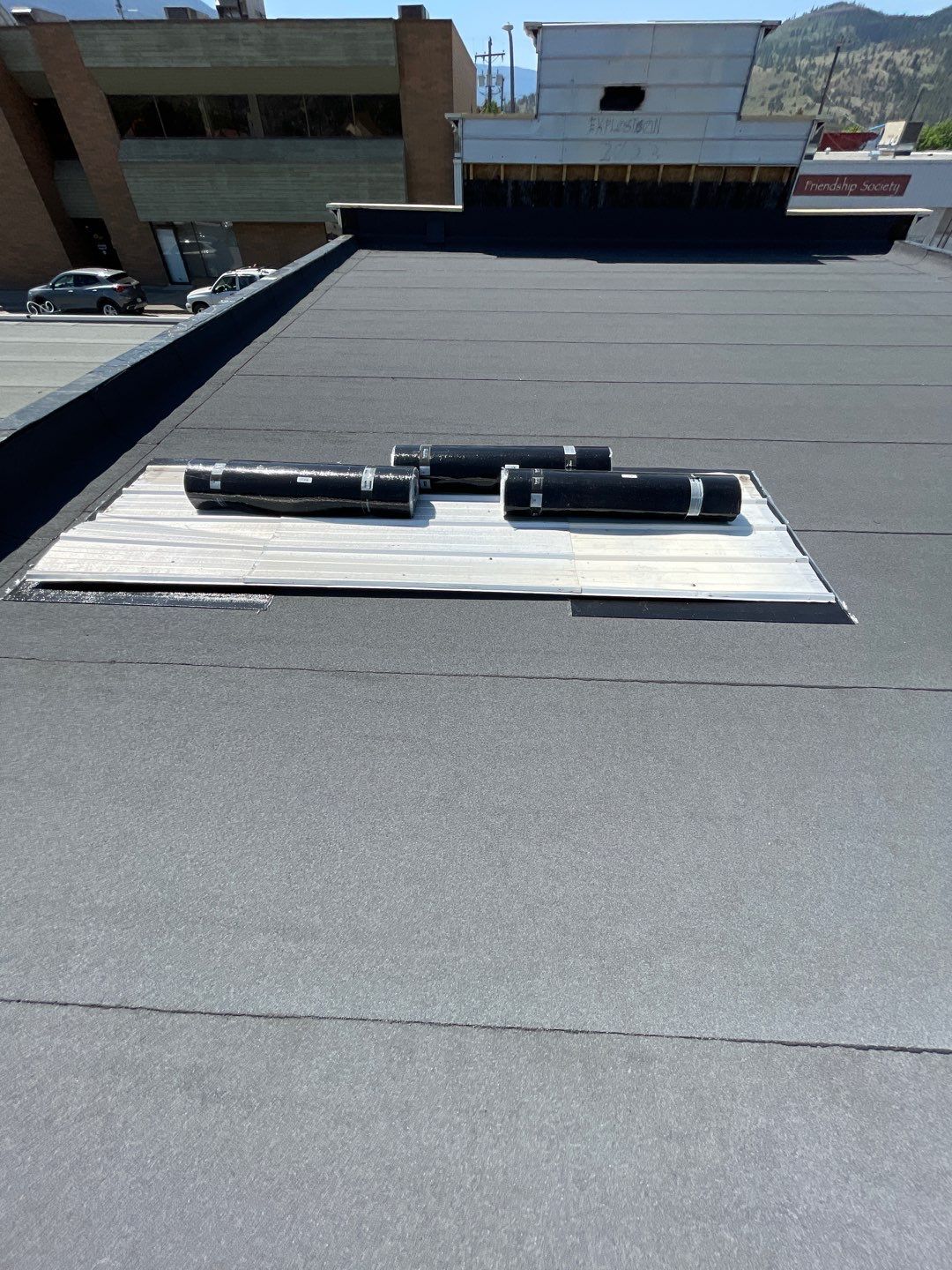 Commercial ReRoofing Installation using IKO 2ply sbs by Top Notch Roofing Inc