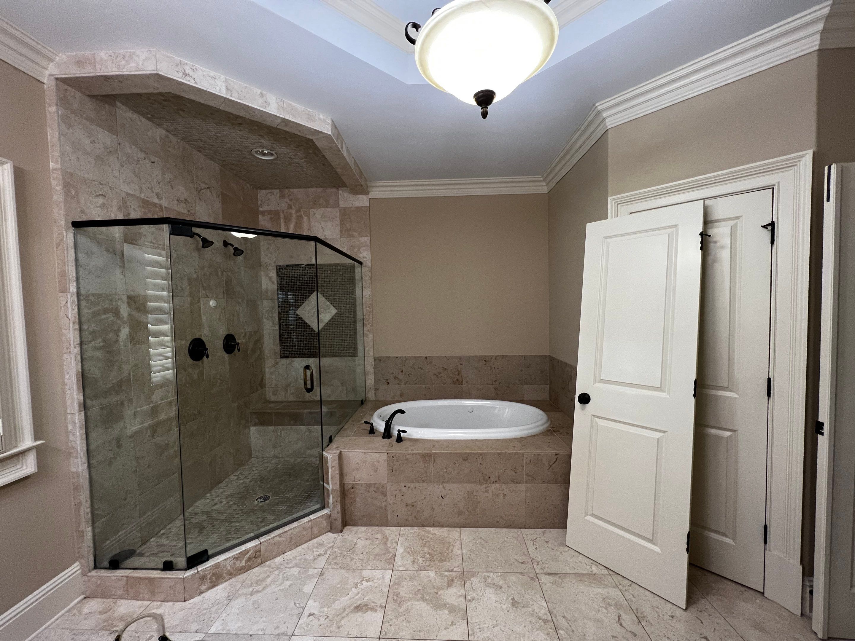 Modern Master Bathroom Renovation With Freestanding Tub in Smyrna by Swift Home Renovations 