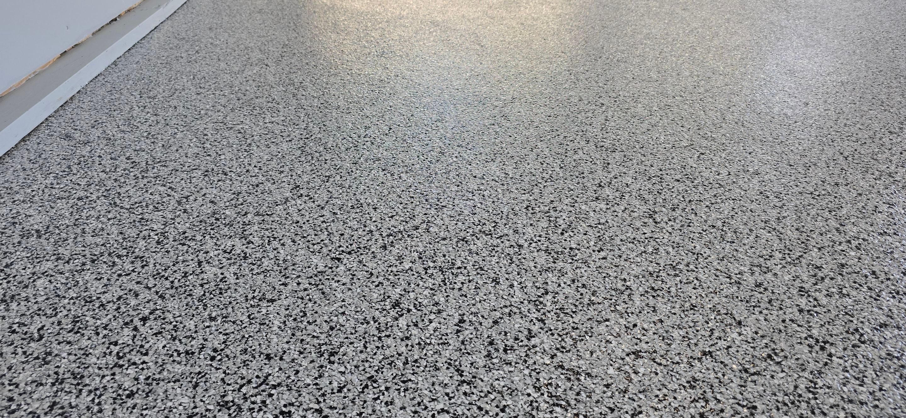 Garage using Houndstooth by Elite Floor Solutions