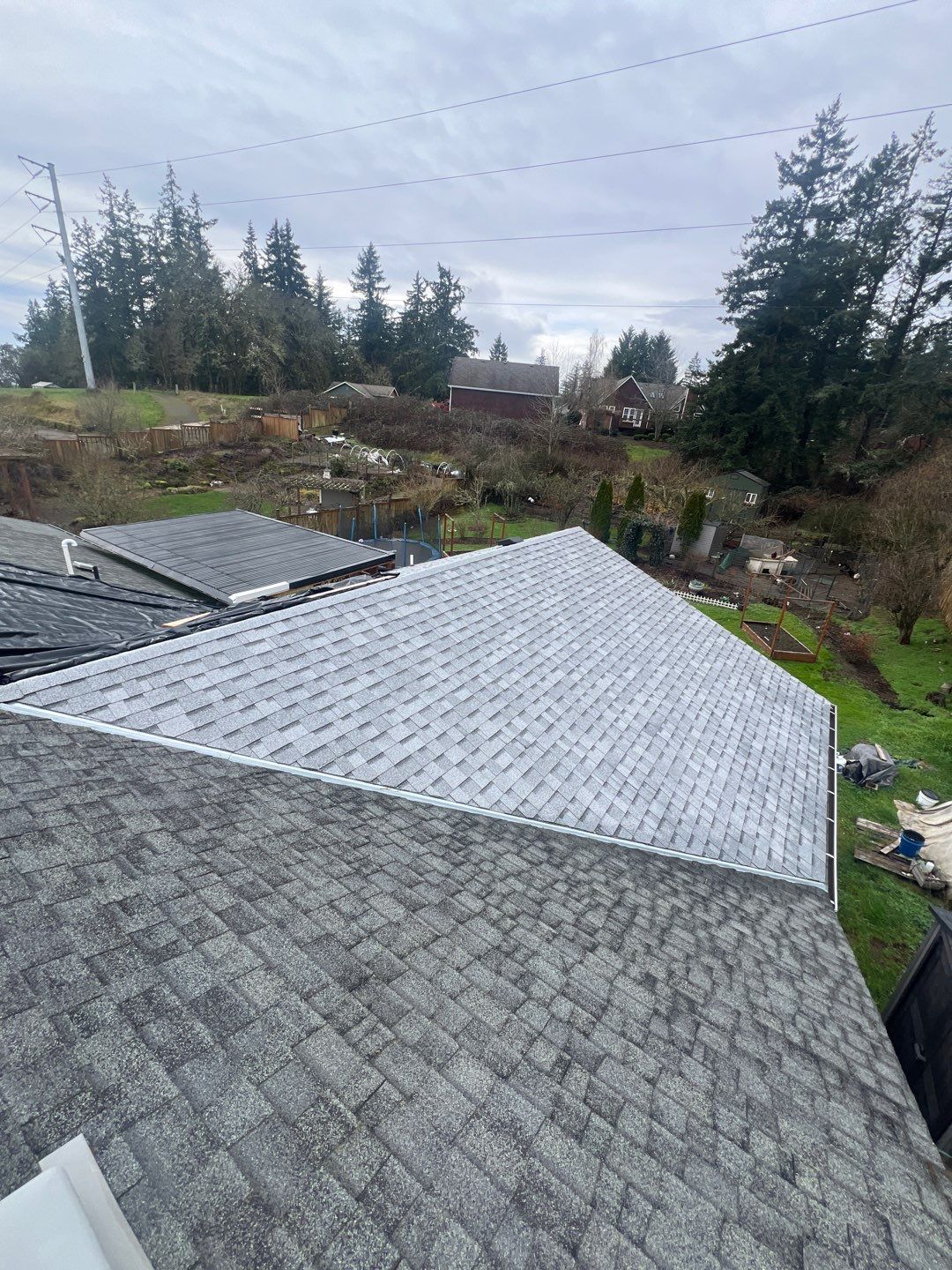 Residential Roofing Installation using IKO Cambridge (Color: Dual Grey) by Orezona Building & Roofing Company, Inc.