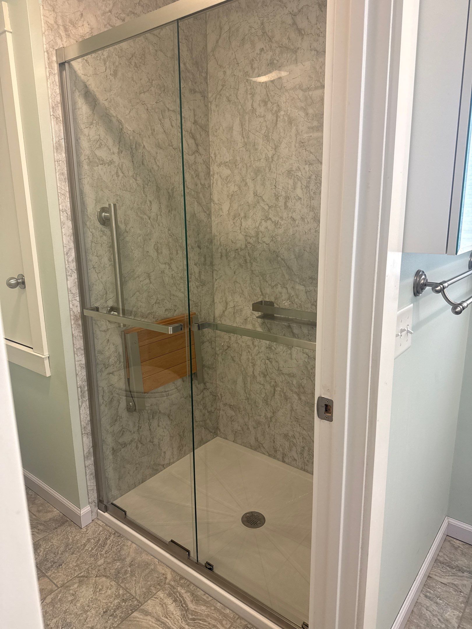 Traverse City Bath & Shower Remodel with Jacuzzi Installation by Rainbow Seamless Systems