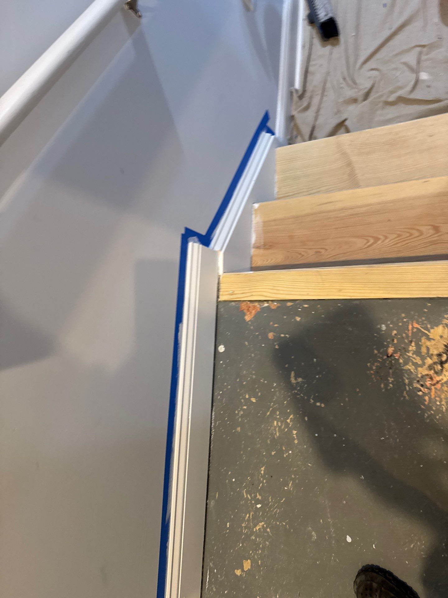 Stairway Installation using t vinyl stair tread and reversibleriser by La Bendicion Contruction Llc