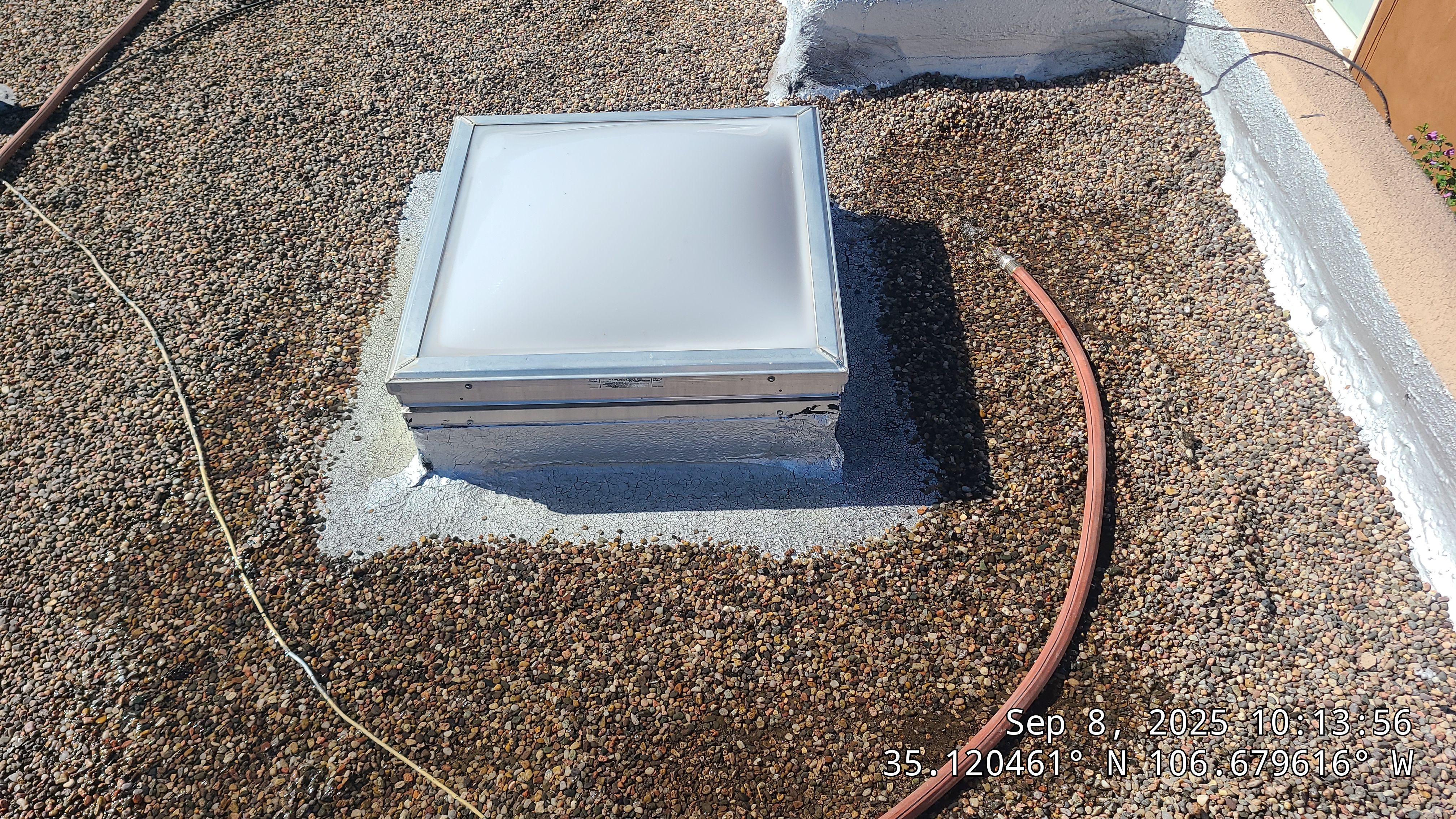 Roof Maintenance and Low-E Tempered Glass Skylight Replacement on Gravel Roof in Northwest Albuquerque by Doyle Roof Masters Inc
