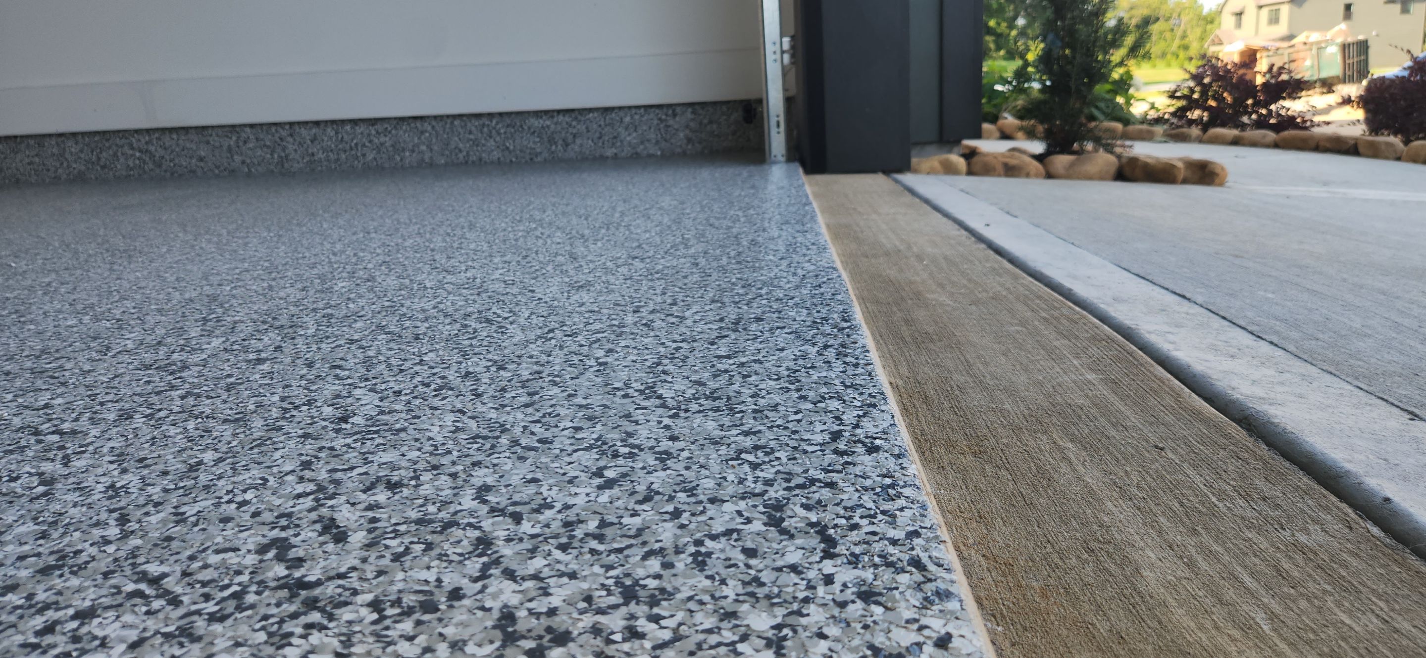 Garage using Gravel by Elite Floor Solutions