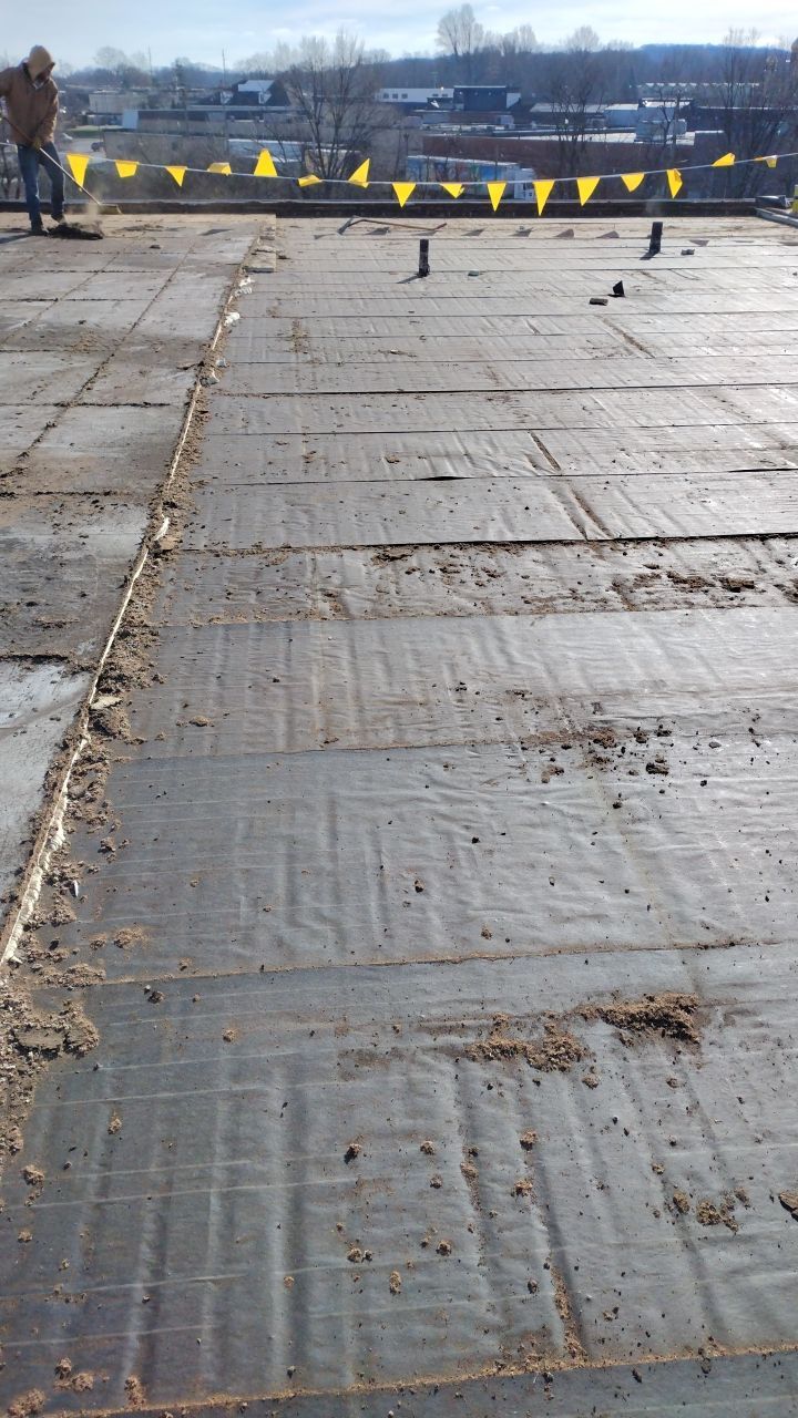Commercial flat roof parma by Absolute Roofing and Construction