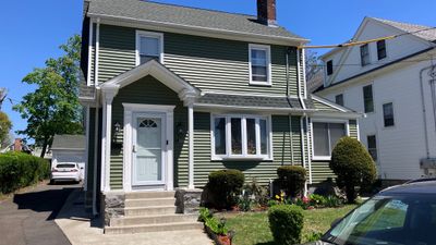 Siding revitalization with Cert Monogram D/4 x 12'6" clapboard, Olive Grove
