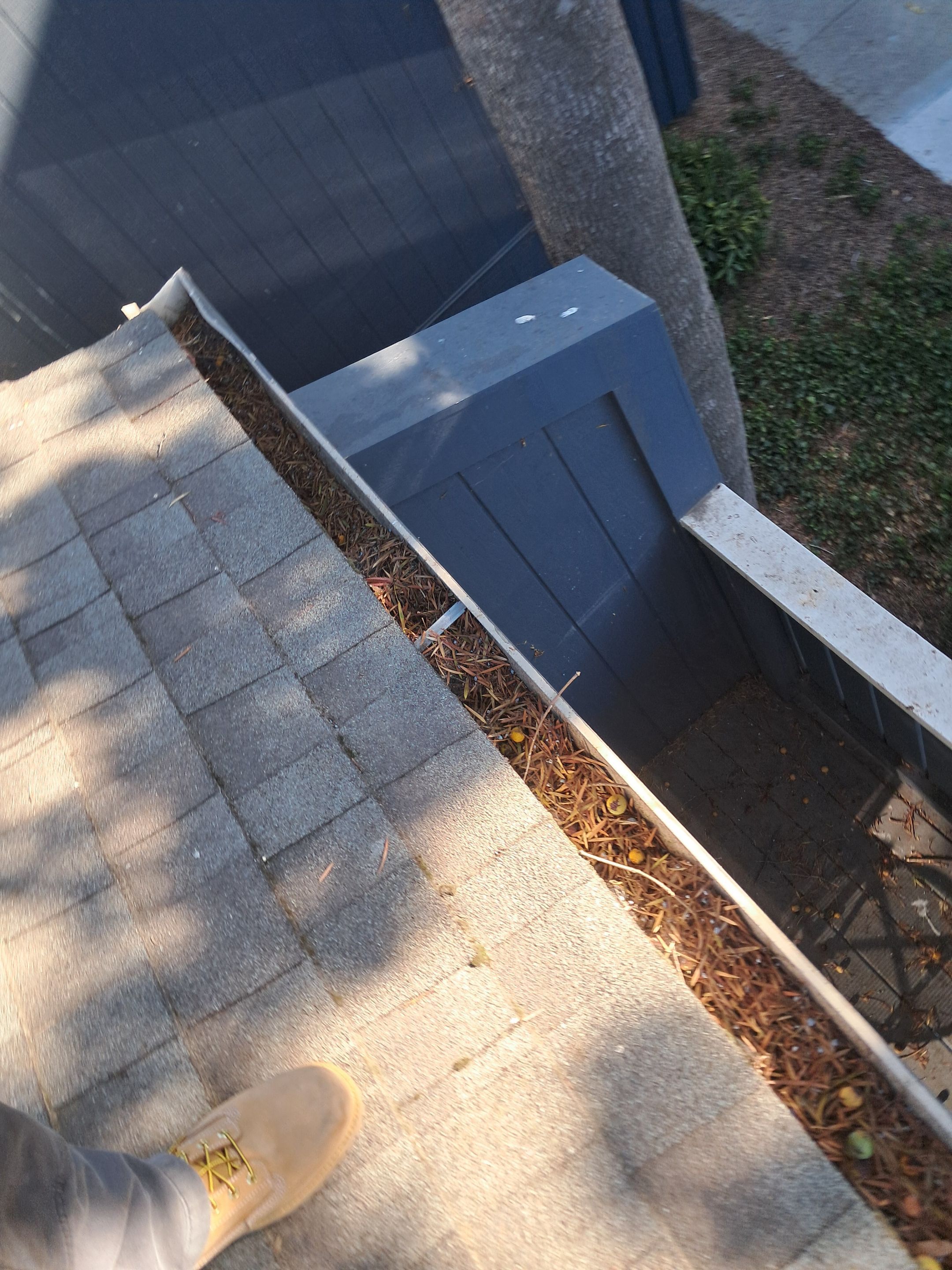 Commercial gutter cleaning San Francisco, CA before photo with filled gutters