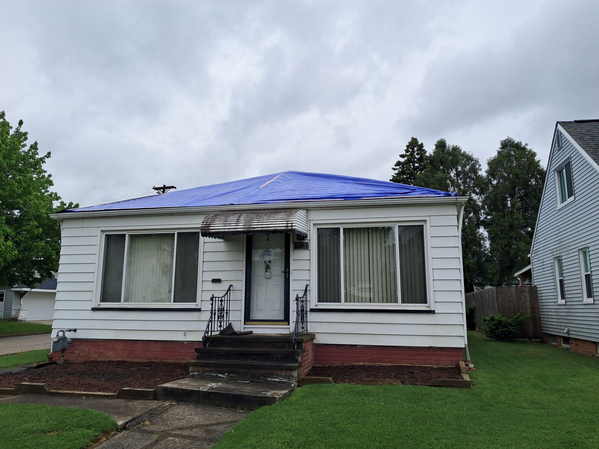 EMERGENCY TARPING ROOF BEFORE STORM using TARP by Absolute Roofing and Construction