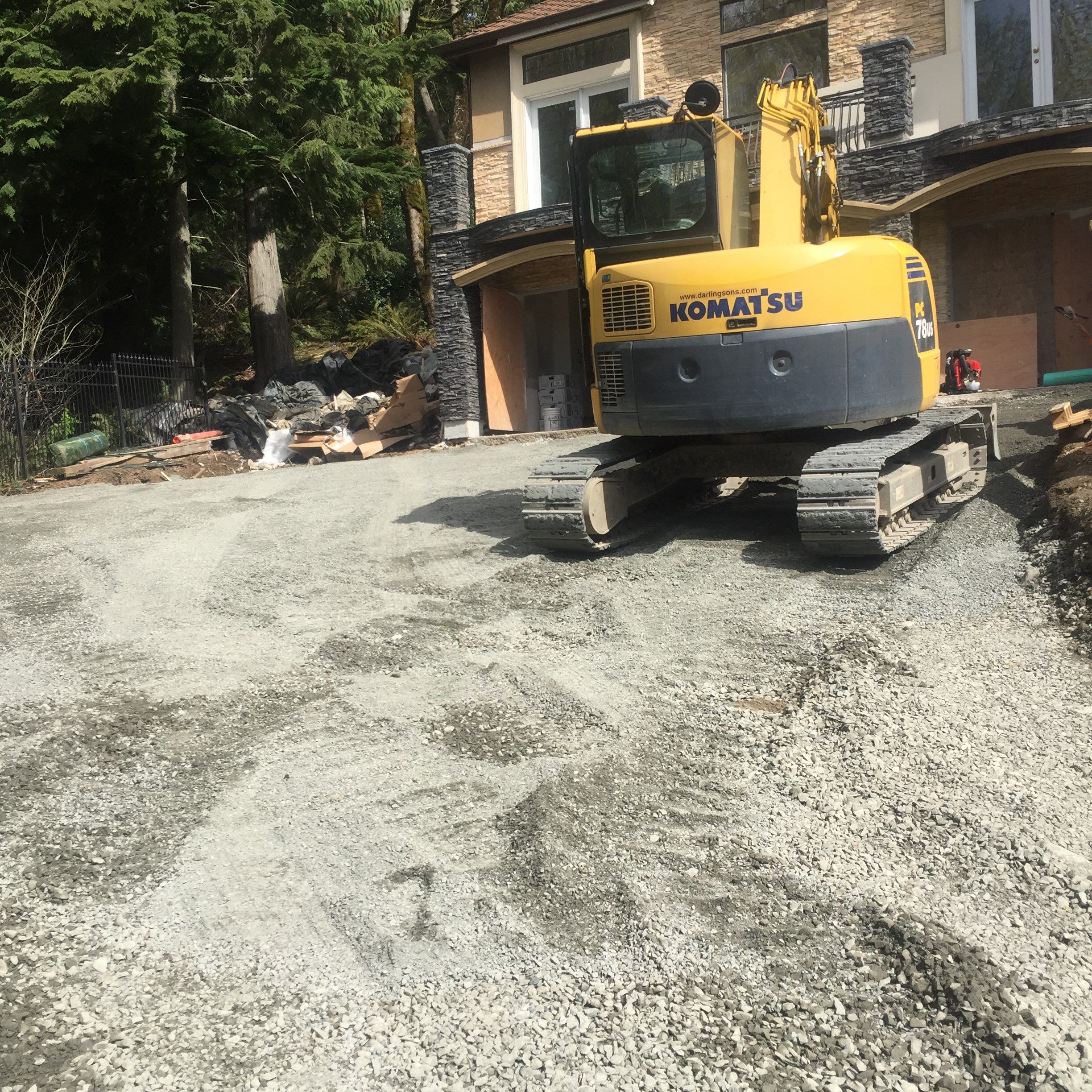 Asphalt Driveway and Stamped Concrete Patio Finish  by Jireh Asphalt & Concrete Inc 