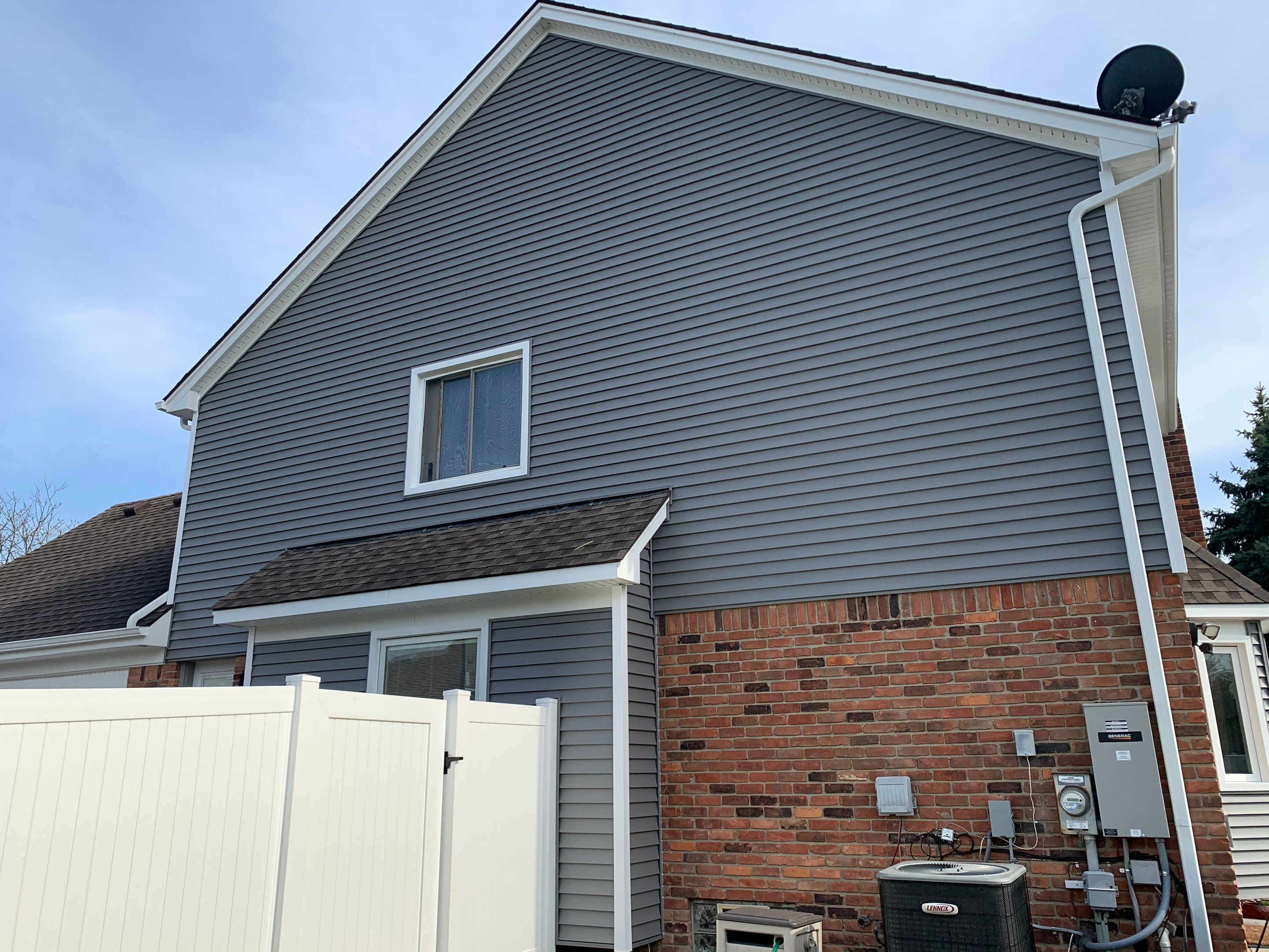 Siding Replacement - Private Residence  by Bloomfield Construction & Restoration