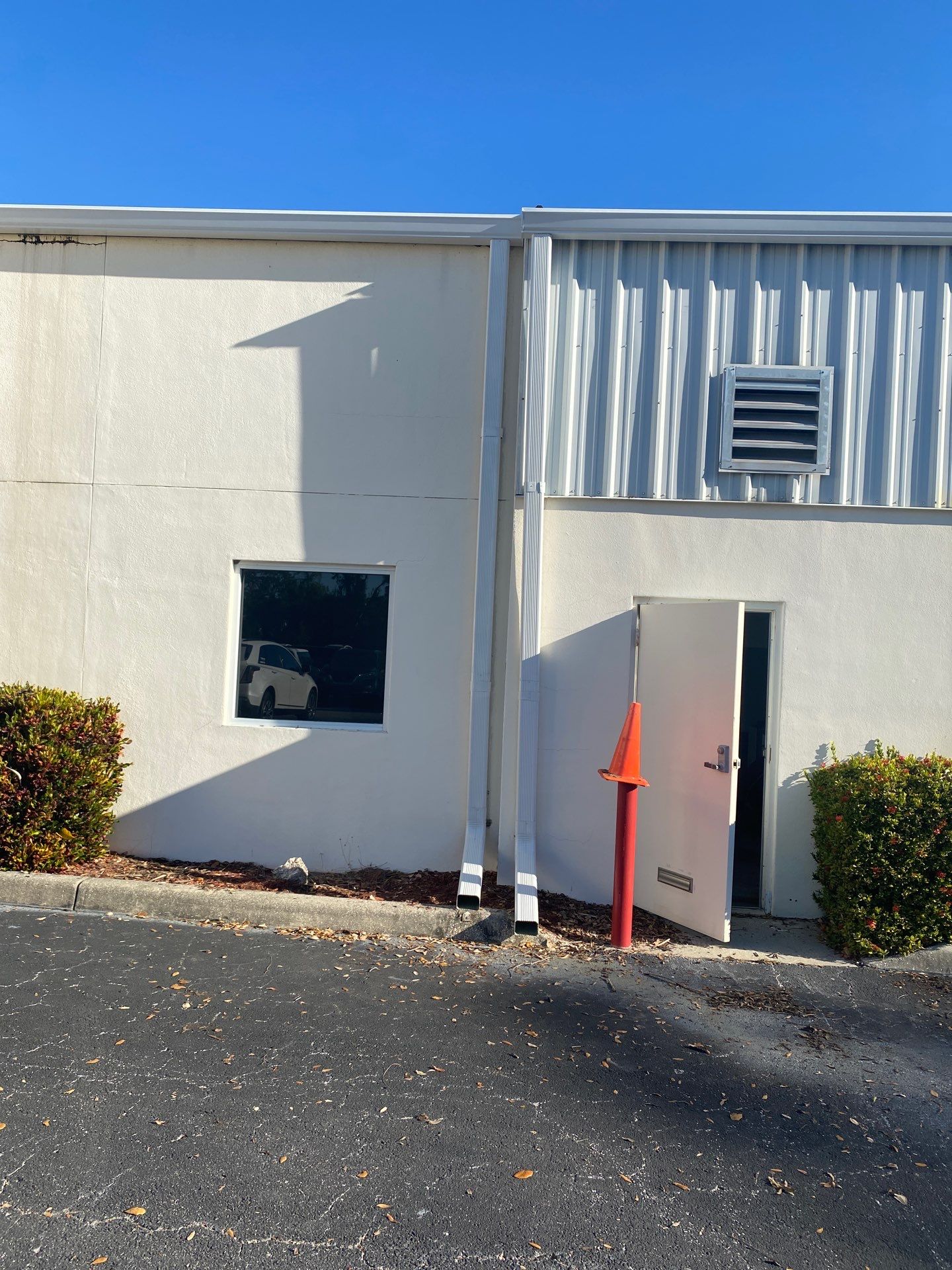 White 6-Inch Gutters with Downspouts in Bradenton FL by Gutter Professors