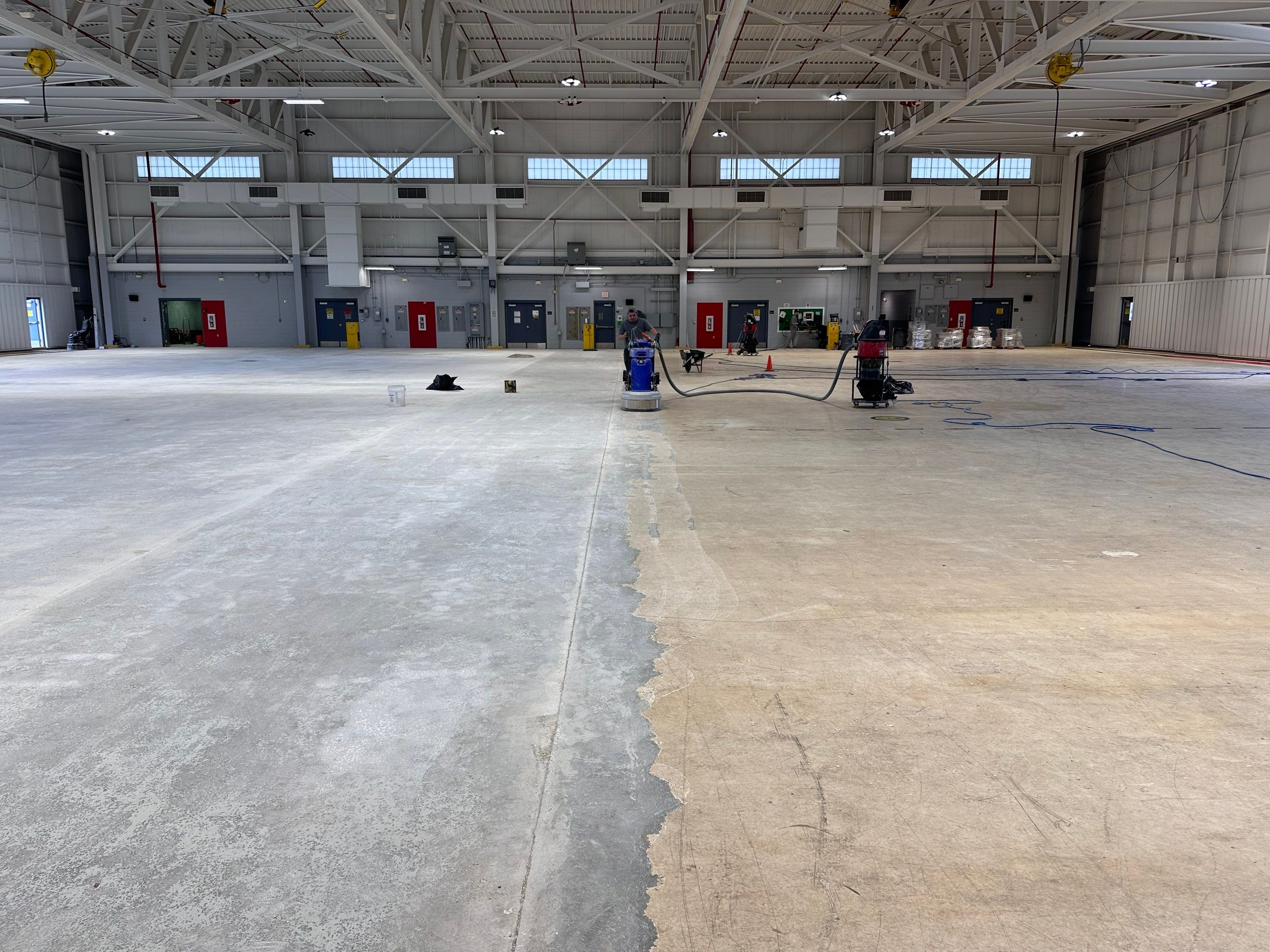 Industrial Epoxy Flooring for Army National Guard Hangar in Mobile by Cornerstone Hard Surface Restoration 