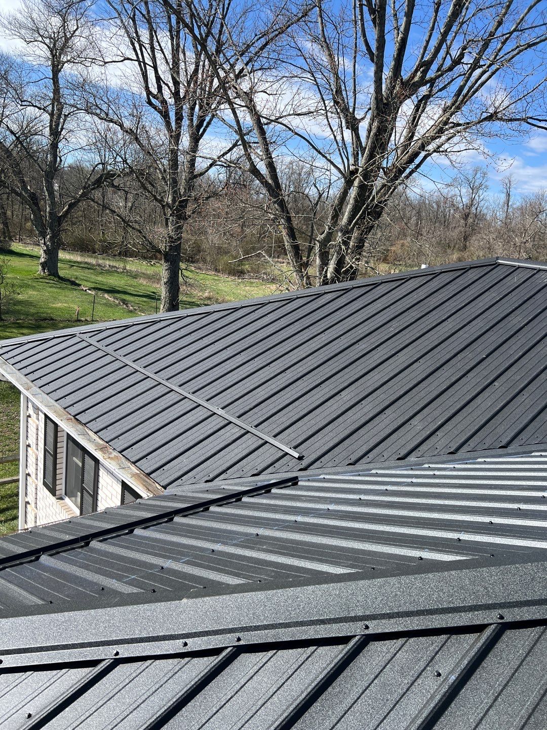 Commercial Roofing Installation using Performance Panel Metal - Frost Black by RoofX 