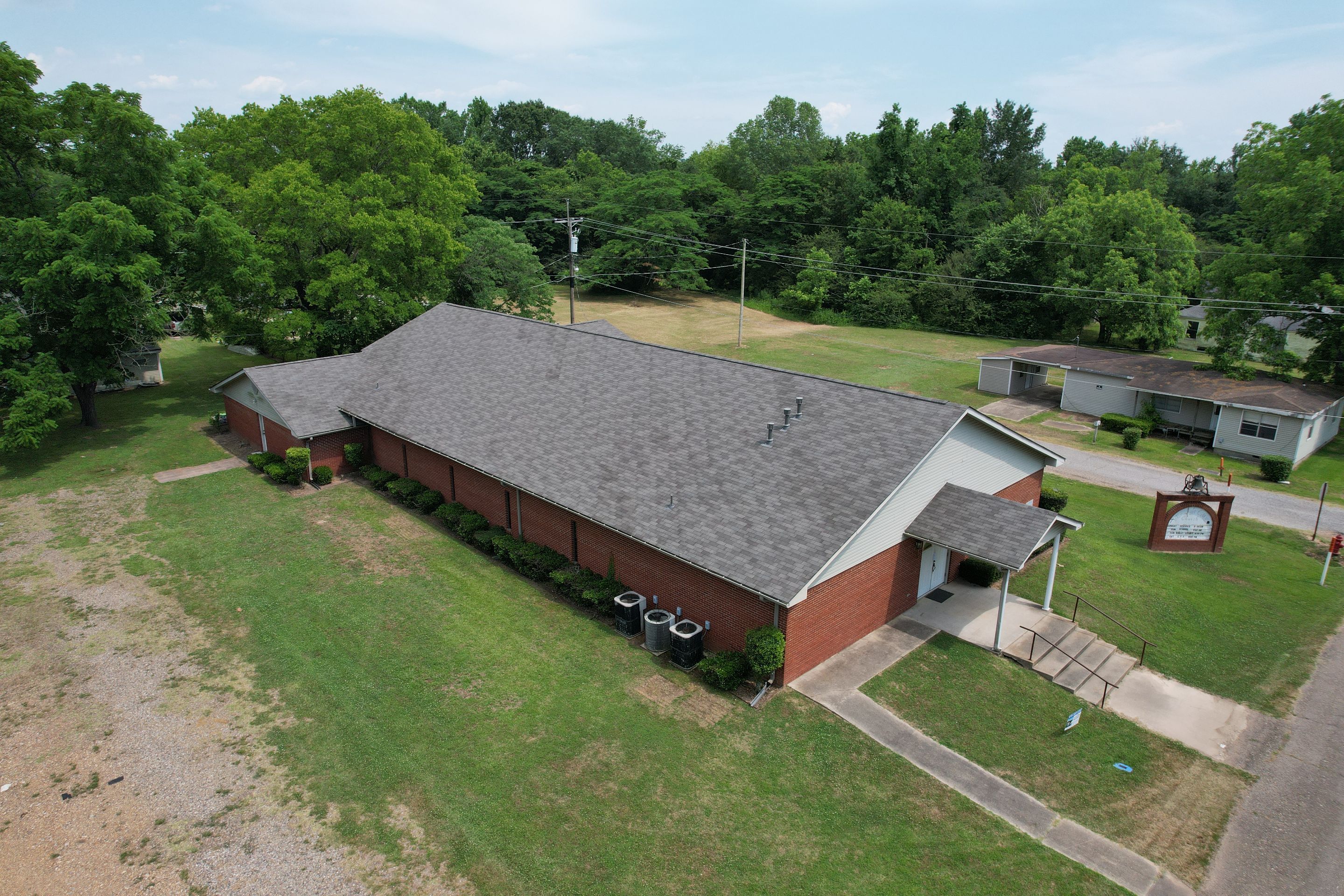 Storm Restoration Reroof: 25 Year 3-Tab Shingle by Hostetler Roofing