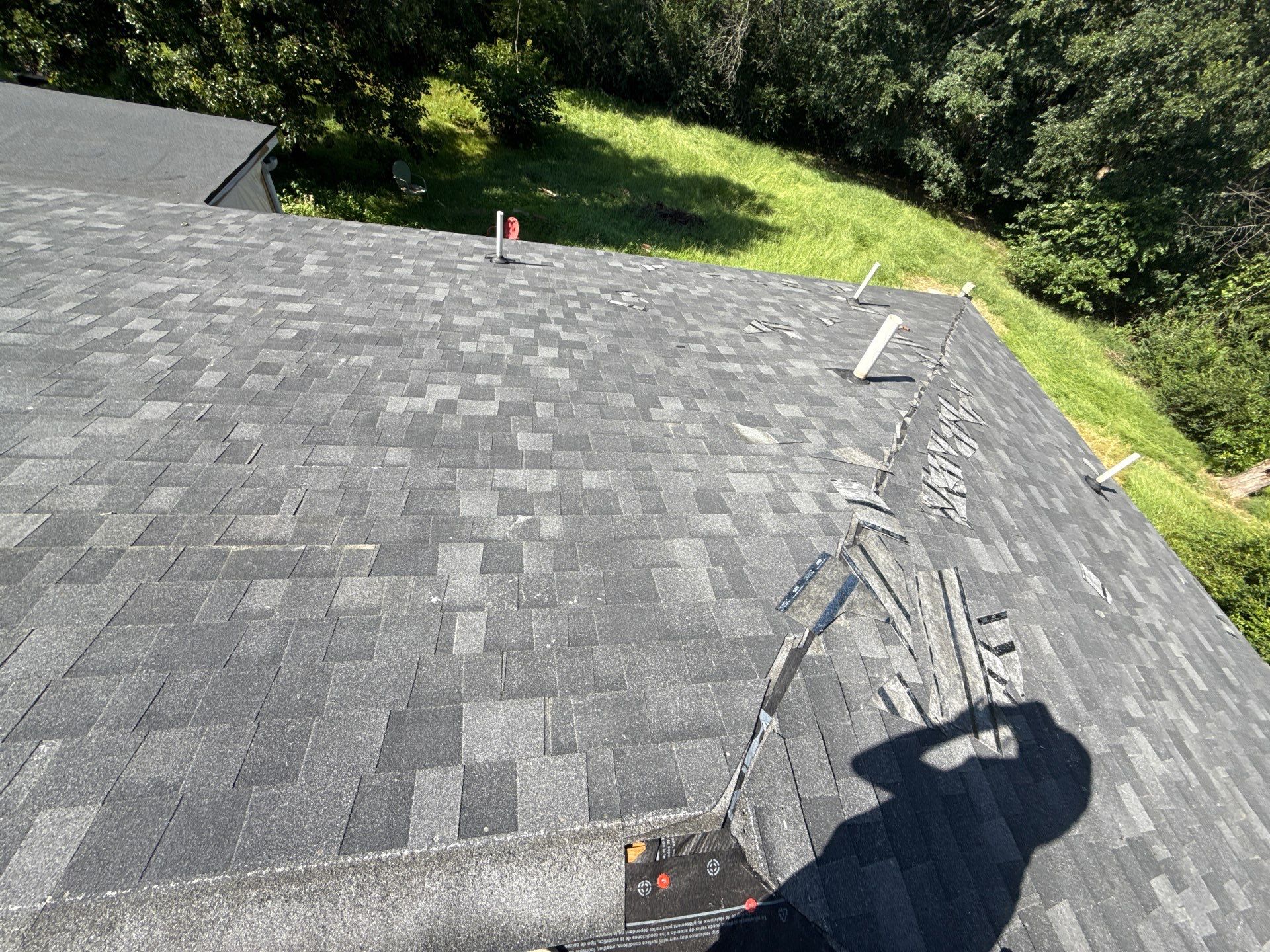 2 layers tear off & installation of new architectural shingles. by In & Out Construction & Remodeling, LLC