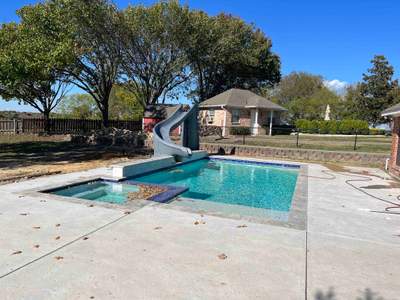 Geometric Pool with Raised Spa and Slide