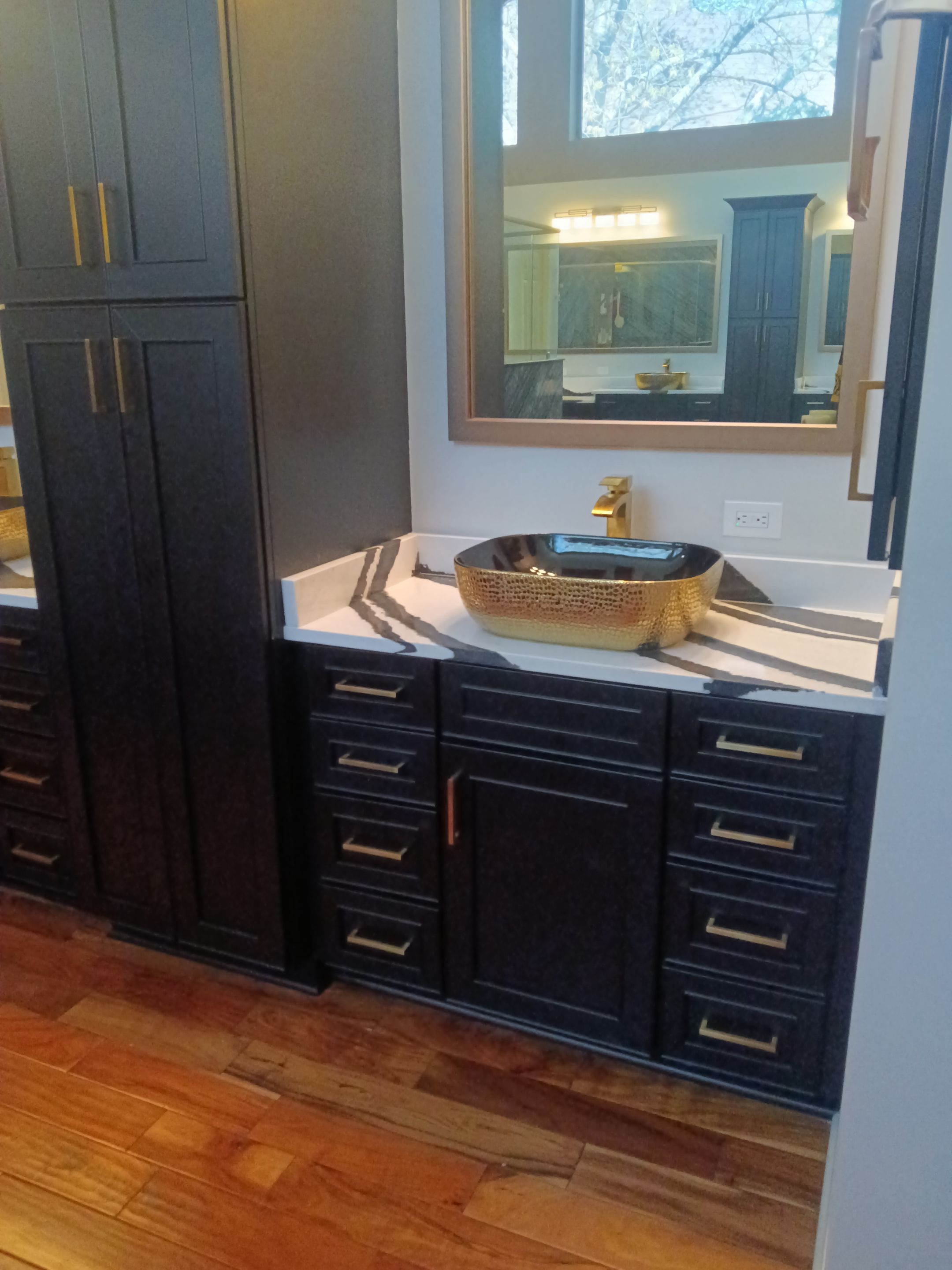 Bookmatched Natural Stone Shower by Legacy Bath and Kitchen 