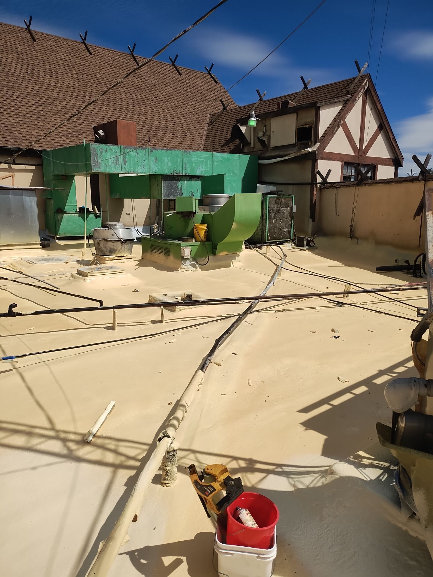 Spray foam and coatings using General Coatings acrylic coatings and spray foam by Straight Edge Roofing Inc