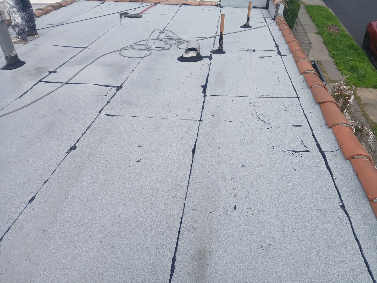 Silicone Membrane Installation using American Standard Coatings Silicone-S by Hull Brothers Roofing